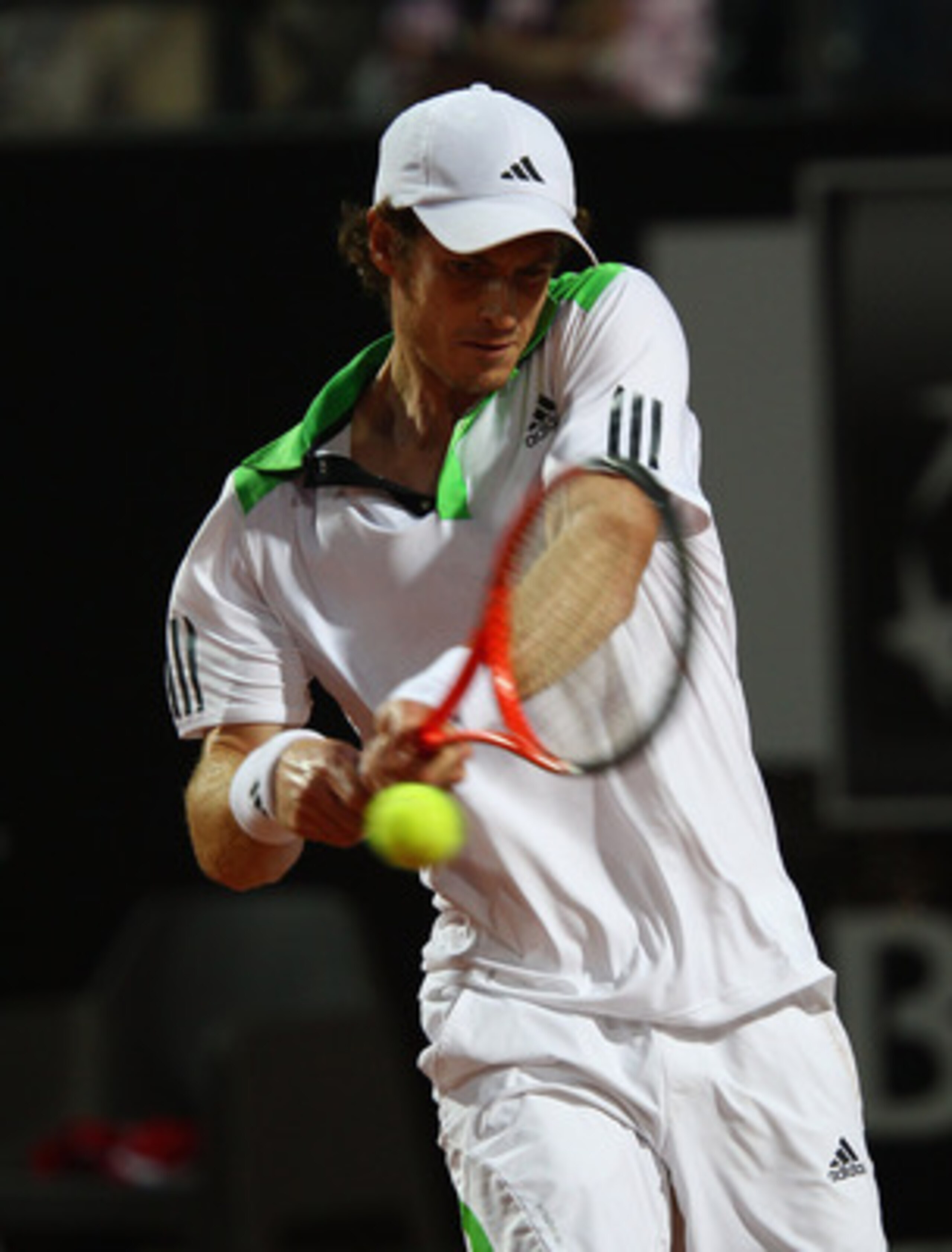 ROME, ITALY - MAY 14:  Andy Murray of Great Britain plays a backhand during his semi final match againstNovak Djokovic of Serbia during day seven of the Internazoinali BNL D'Italia at the Foro Italico Tennis Centre  on May 14, 2011 in Rome, Italy.  (Photo