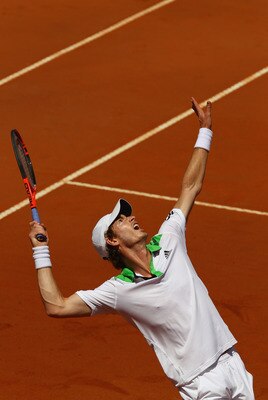 ROME, ITALY - MAY 13:  Andy Murray of Great Britain serves during his quarter final match against Florian Mayer of Germany during day six of the Internazoinali BNL D'Italia at the Foro Italico Tennis Centre  on May 13, 2011 in Rome, Italy.  (Photo by Cliv