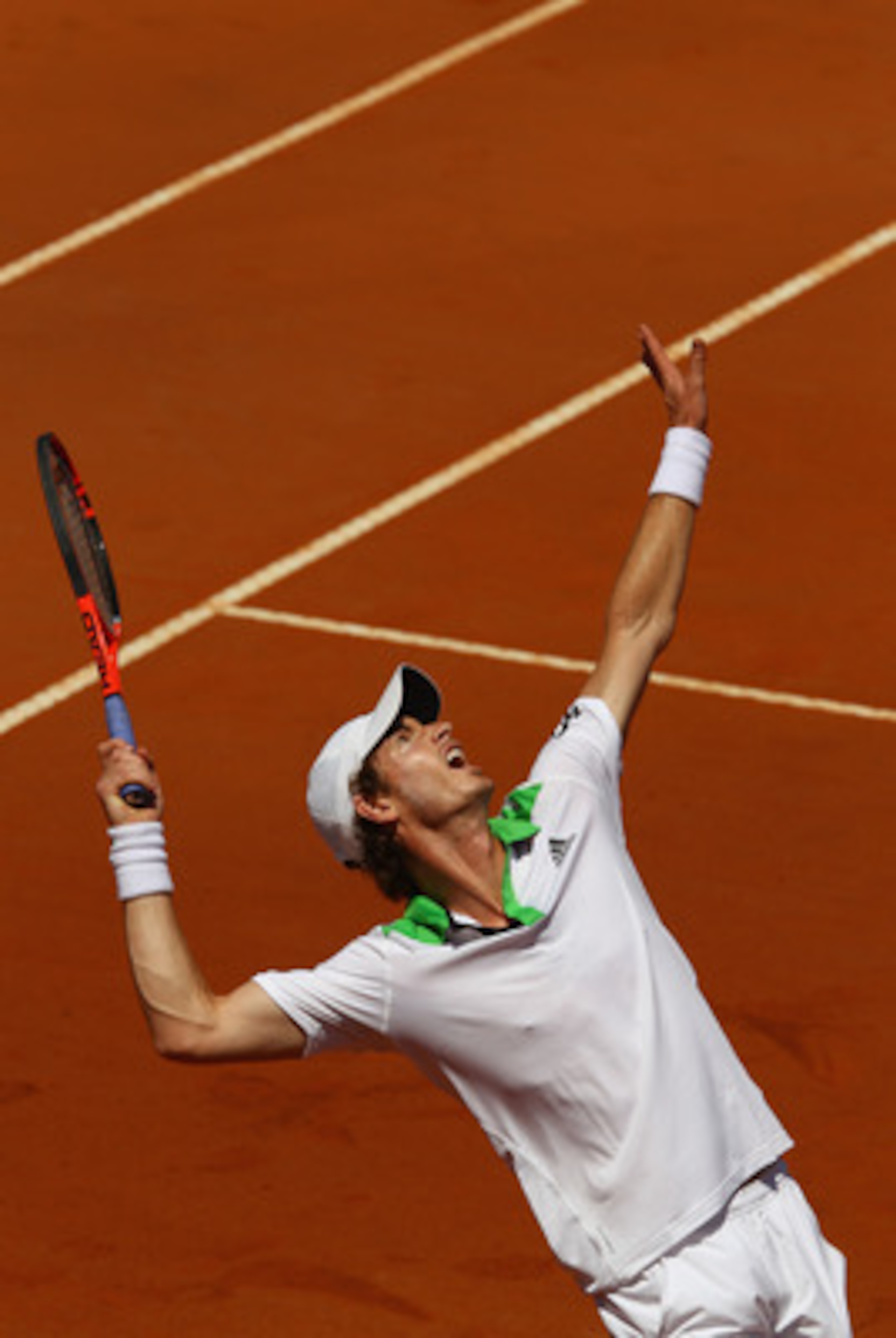 ROME, ITALY - MAY 13:  Andy Murray of Great Britain serves during his quarter final match against Florian Mayer of Germany during day six of the Internazoinali BNL D'Italia at the Foro Italico Tennis Centre  on May 13, 2011 in Rome, Italy.  (Photo by Cliv