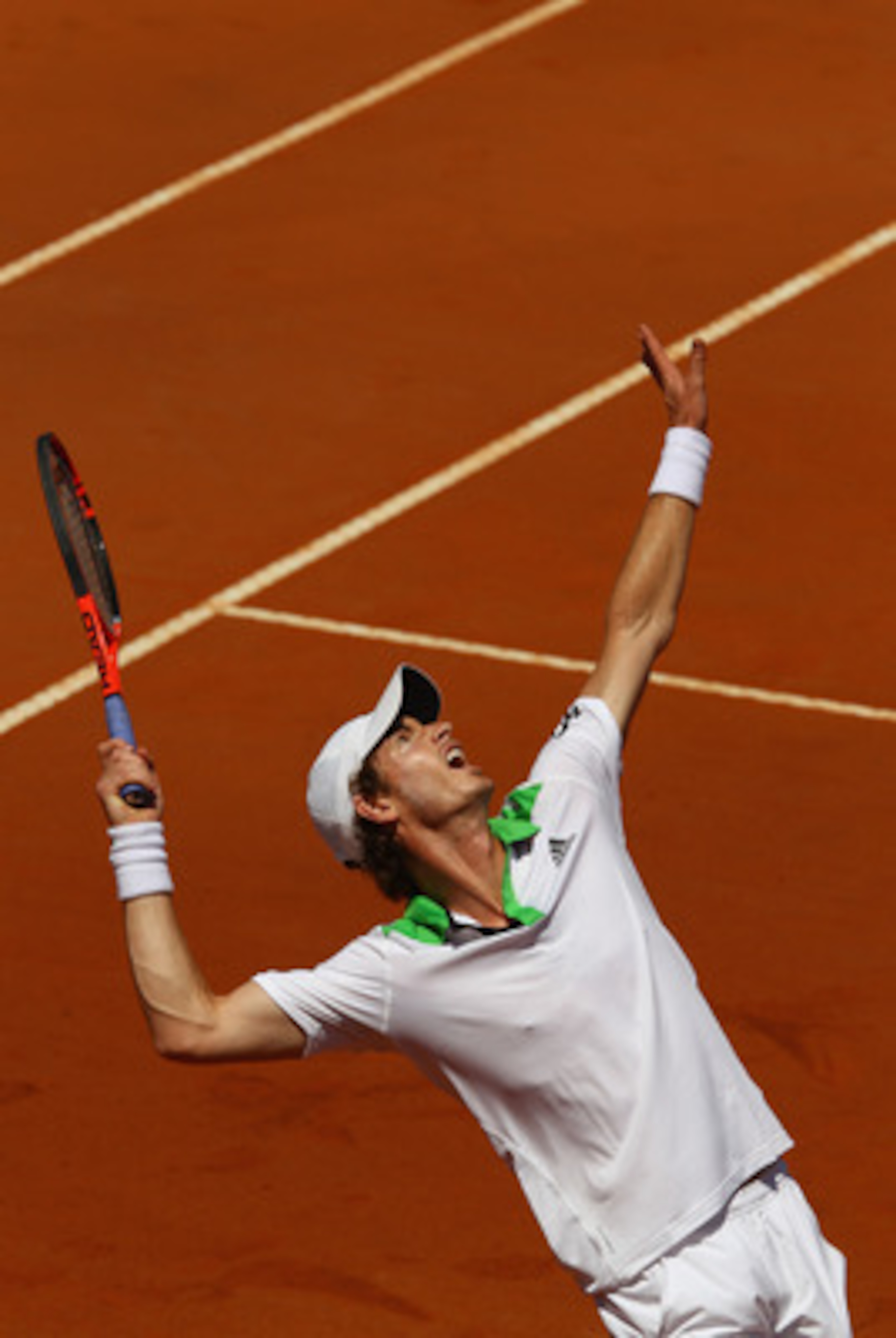 ROME, ITALY - MAY 13:  Andy Murray of Great Britain serves during his quarter final match against Florian Mayer of Germany during day six of the Internazoinali BNL D'Italia at the Foro Italico Tennis Centre  on May 13, 2011 in Rome, Italy.  (Photo by Cliv