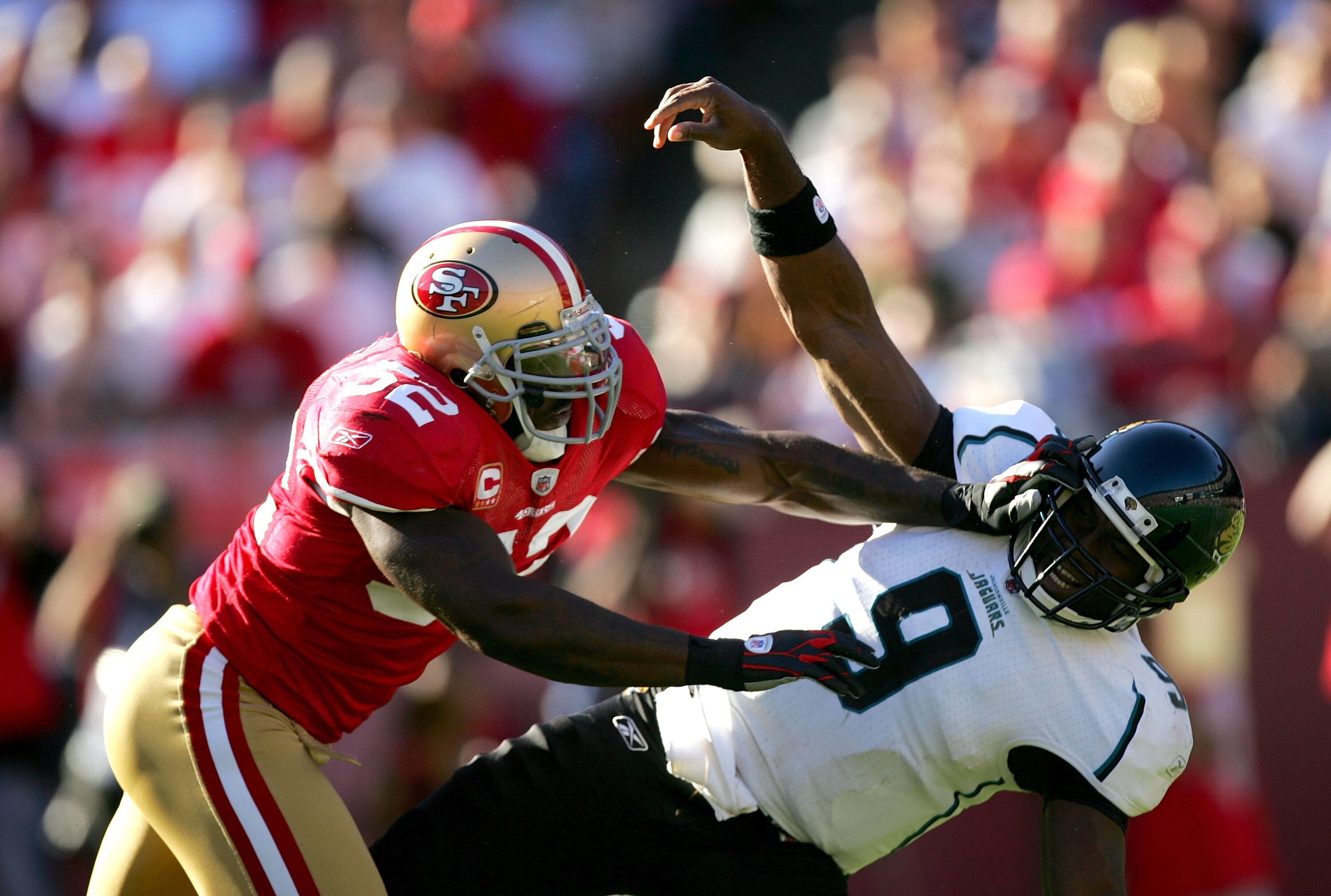 SAN FRANCISCO - NOVEMBER 29:  Patrick Willis #52 of the San Francisco 49ers hits David Garrard #9 of the Jacksonville Jaguars at Candlestick Park on November 29, 2009 in San Francisco, California.  (Photo by Ezra Shaw/Getty Images)