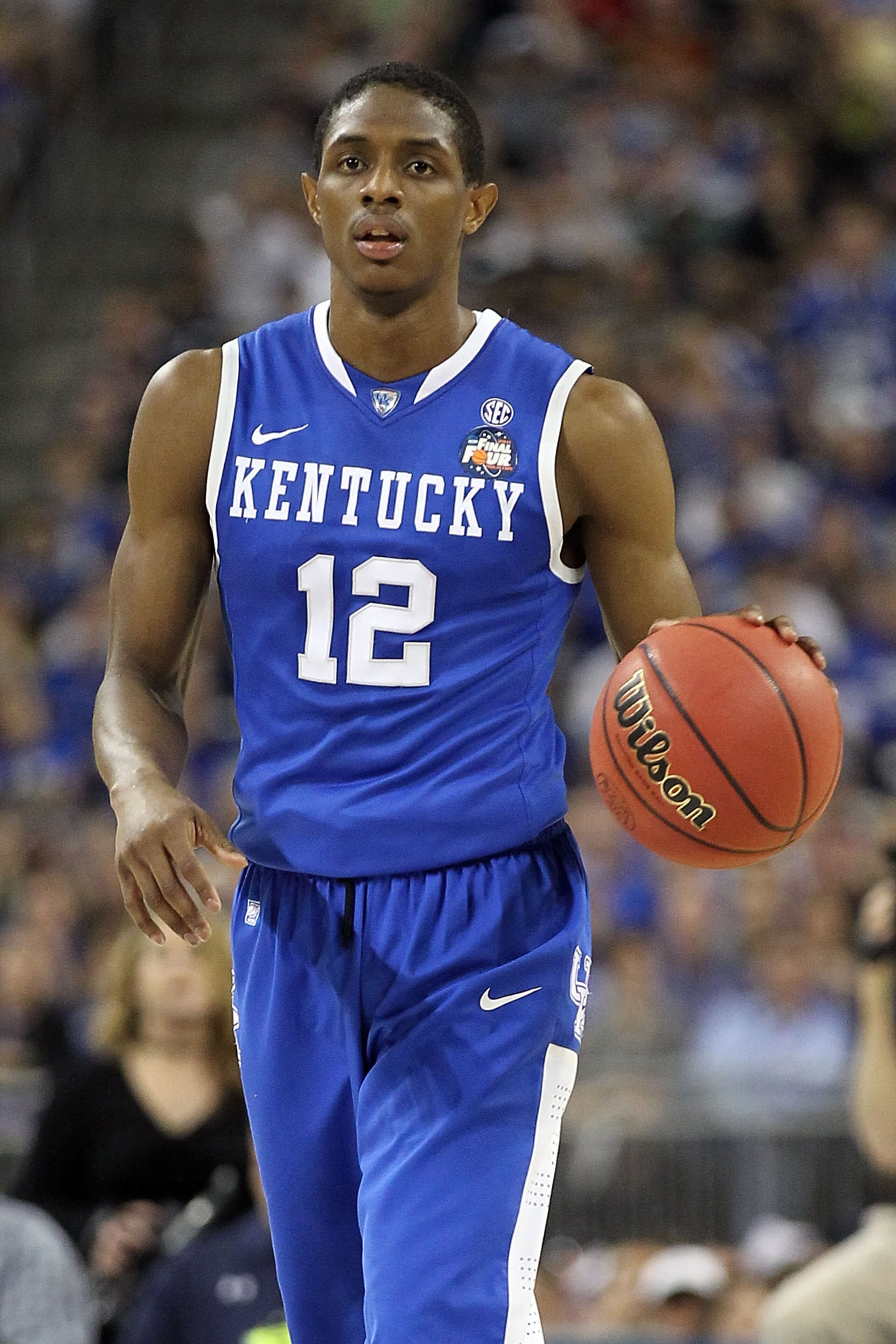 HOUSTON, TX - APRIL 02:  Brandon Knight #12 of the Kentucky Wildcats moves the ball while taking on the Connecticut Huskies during the National Semifinal game of the 2011 NCAA Division I Men's Basketball Championship at Reliant Stadium on April 2, 2011 in