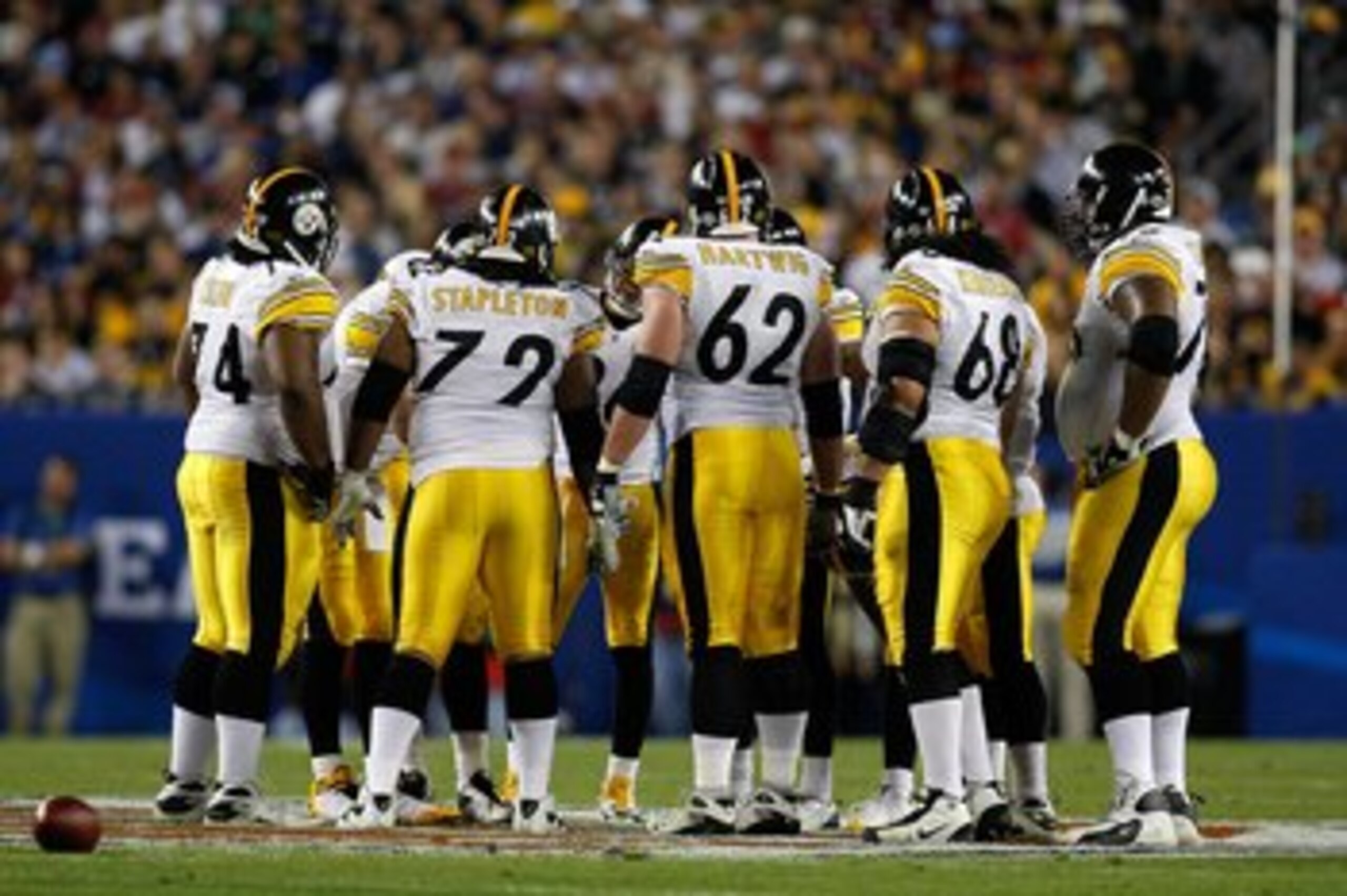 TAMPA, FL - FEBRUARY 01: Offensive linemen (L-R) Willie Colon #74, Darnell Stapleton #72, Justin Hartwig #62,  Chris Kemoeatu #68 and Max Starks #78 of the Pittsburgh Steelers stand in the huddle against the Arizona Cardinals during Super Bowl XLIII on Fe
