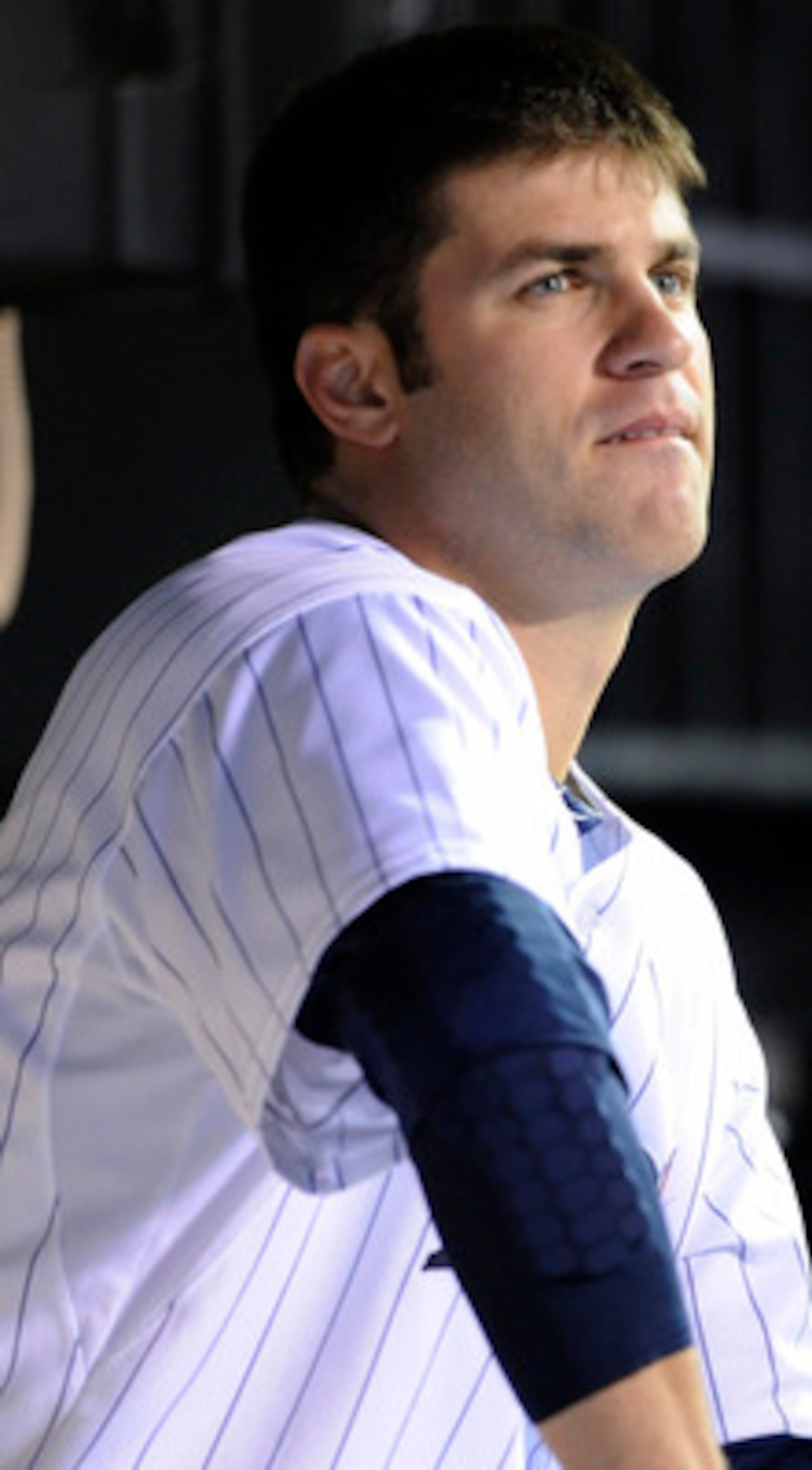 MINNEAPOLIS, MN - APRIL 9: Joe Mauer #7 of the Minnesota Twins in the dugout during the seventh inning of their game against the Oakland Athletics on April 9, 2011 at Target Field in Minneapolis, Minnesota. Athletics defeated the Twins 1-0. (Photo by Hann