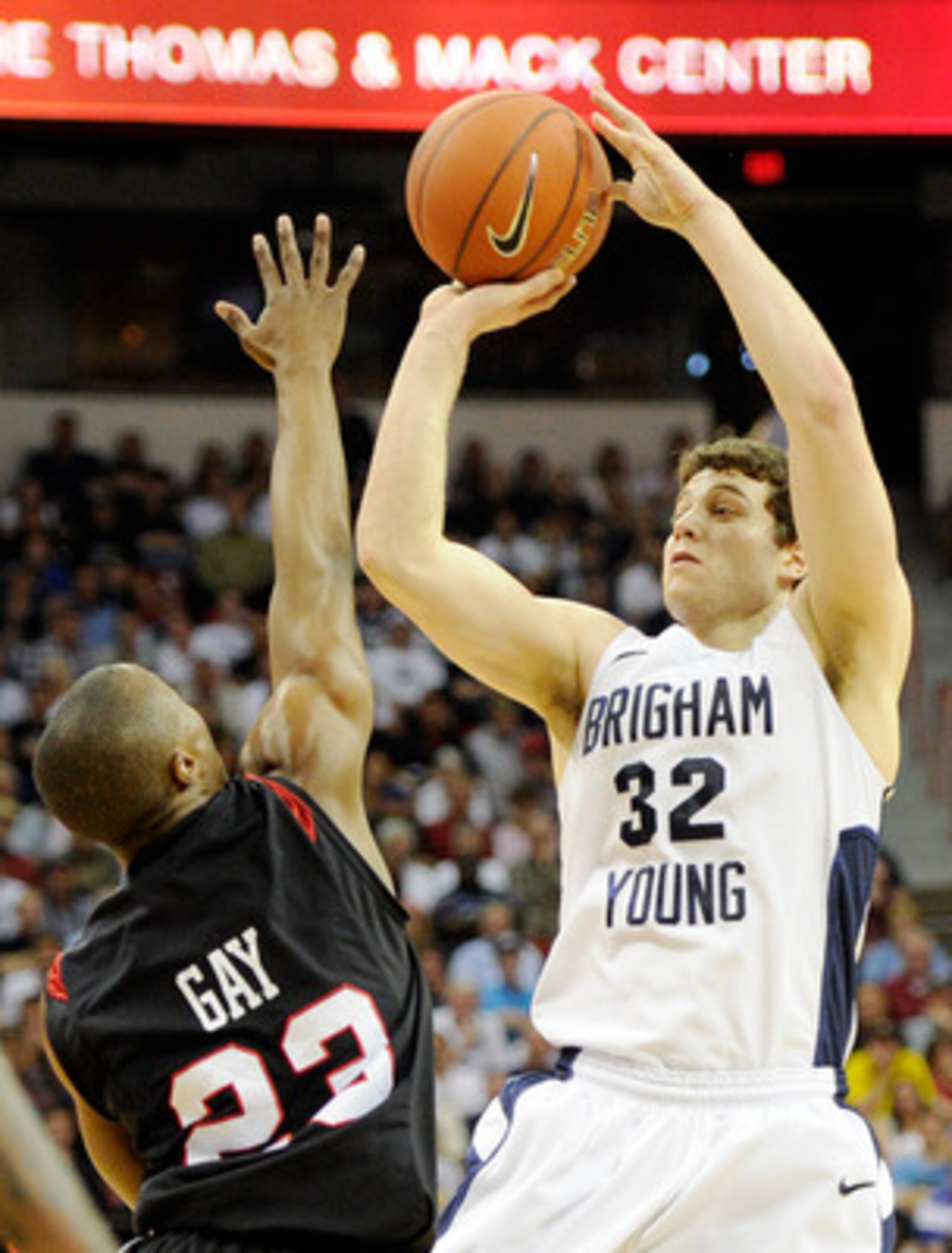 LAS VEGAS, NV - MARCH 12: Jimmer Fredette #32 of the Brigham Young University Cougars shoots against D.J. Gay #23 of the San Diego State Aztecs during the championship game of the Conoco Mountain West Conference Basketball tournament at the Thomas & Mack LAS VEGAS, NV - MARCH 12: Jimmer Fredette #32 of the Brigham Young University Cougars shoots against D.J. Gay #23 of the San Diego State Aztecs during the championship game of the Conoco Mountain West Conference Basketball tournament at the Thomas & Mack