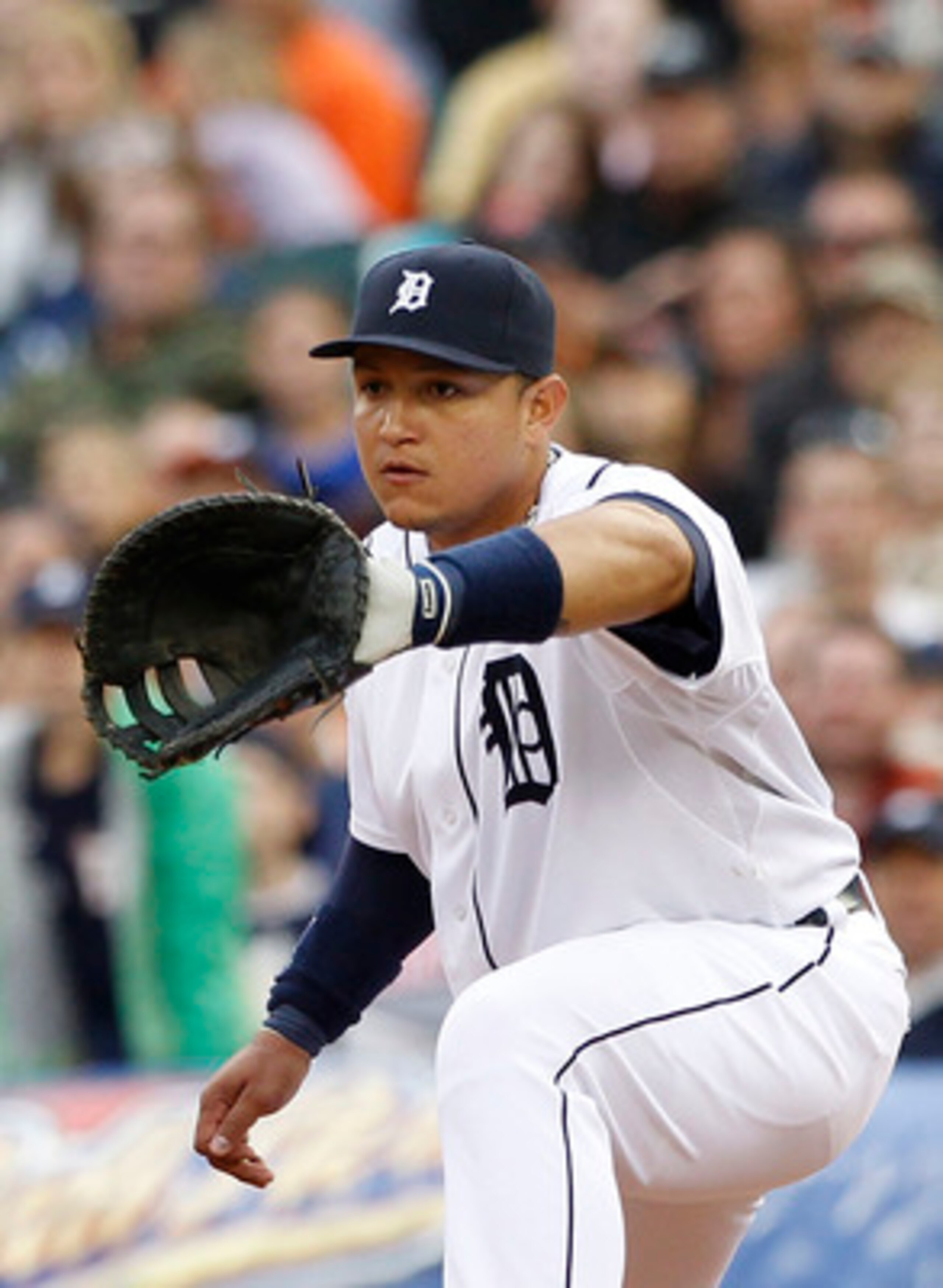 DETROIT, MI - MAY 14:  Miguel Cabrera #24 of the Detroit Tigers makes the put out in the third inning at Comerica Park on May 14, 2011 in Detroit, Michigan. The Tigers defeated the Royals 3-0.  (Photo by Leon Halip/Getty Images)