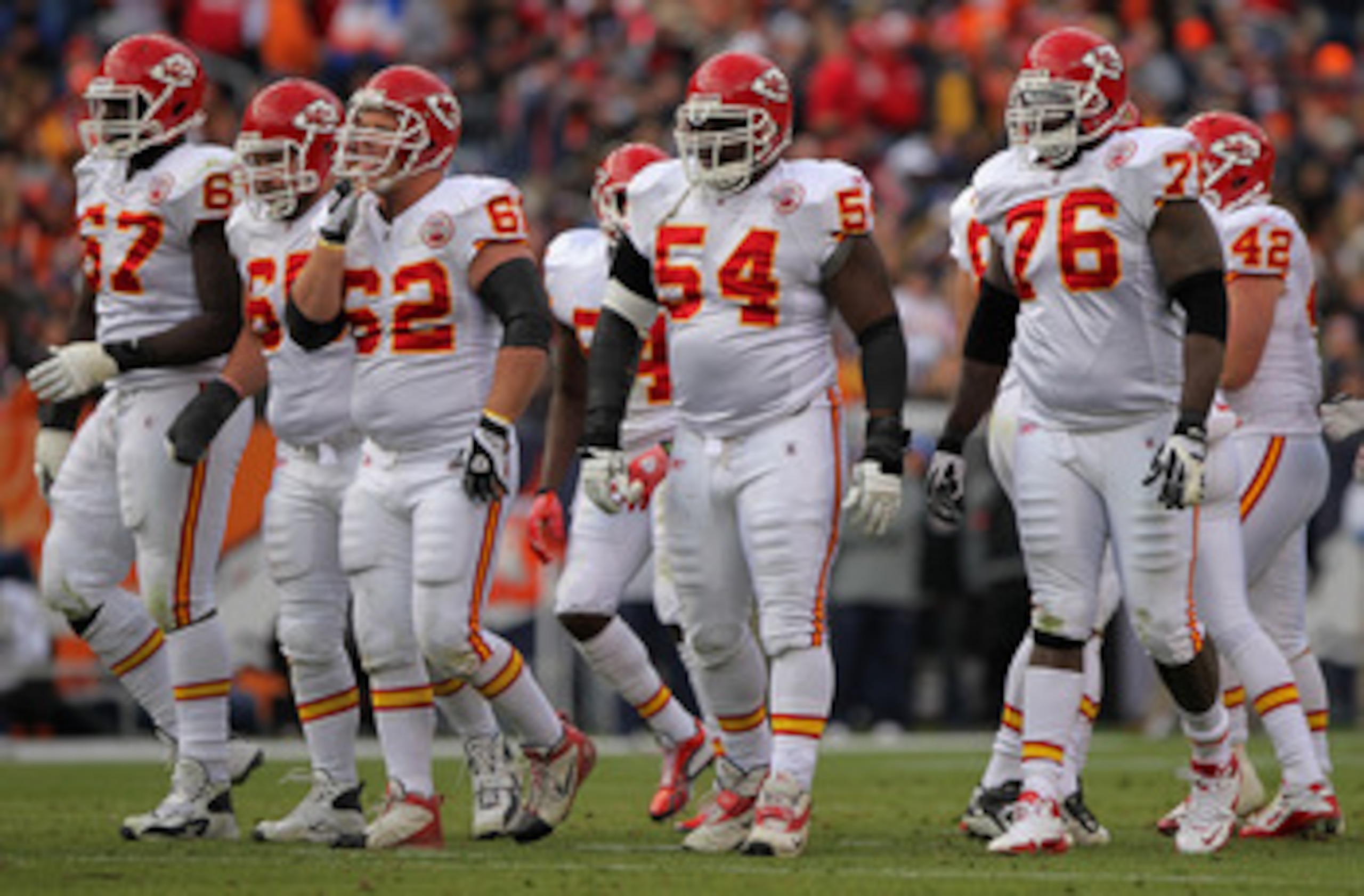 DENVER - NOVEMBER 14:  (L-R) Offensive linemen Barry Richardson #67, Ryan Lilja #65, Casey Wiegmann #62, Brian Waters #54 and Brandon Albert #76 of the Kansas City Chiefs head to the line of scrimmage to face the Denver Broncos defense at INVESCO Field at