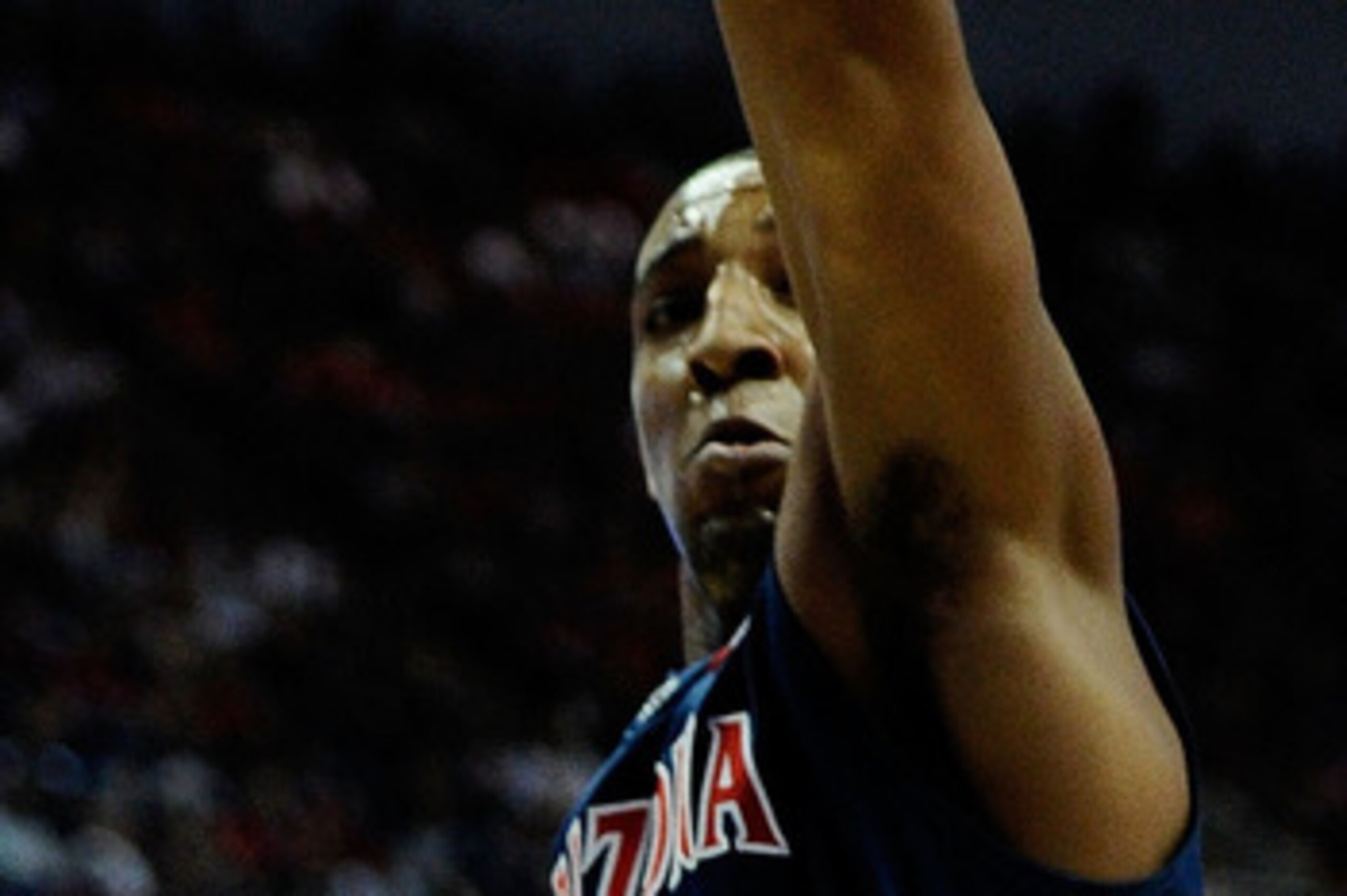 ANAHEIM, CA - MARCH 26:  Kemba Walker #15 of the Connecticut Huskies goes to the basket Derrick Williams #23 of the Arizona Wildcats during the west regional final of the 2011 NCAA men's basketball tournament at the Honda Center on March 26, 2011 in Anahe