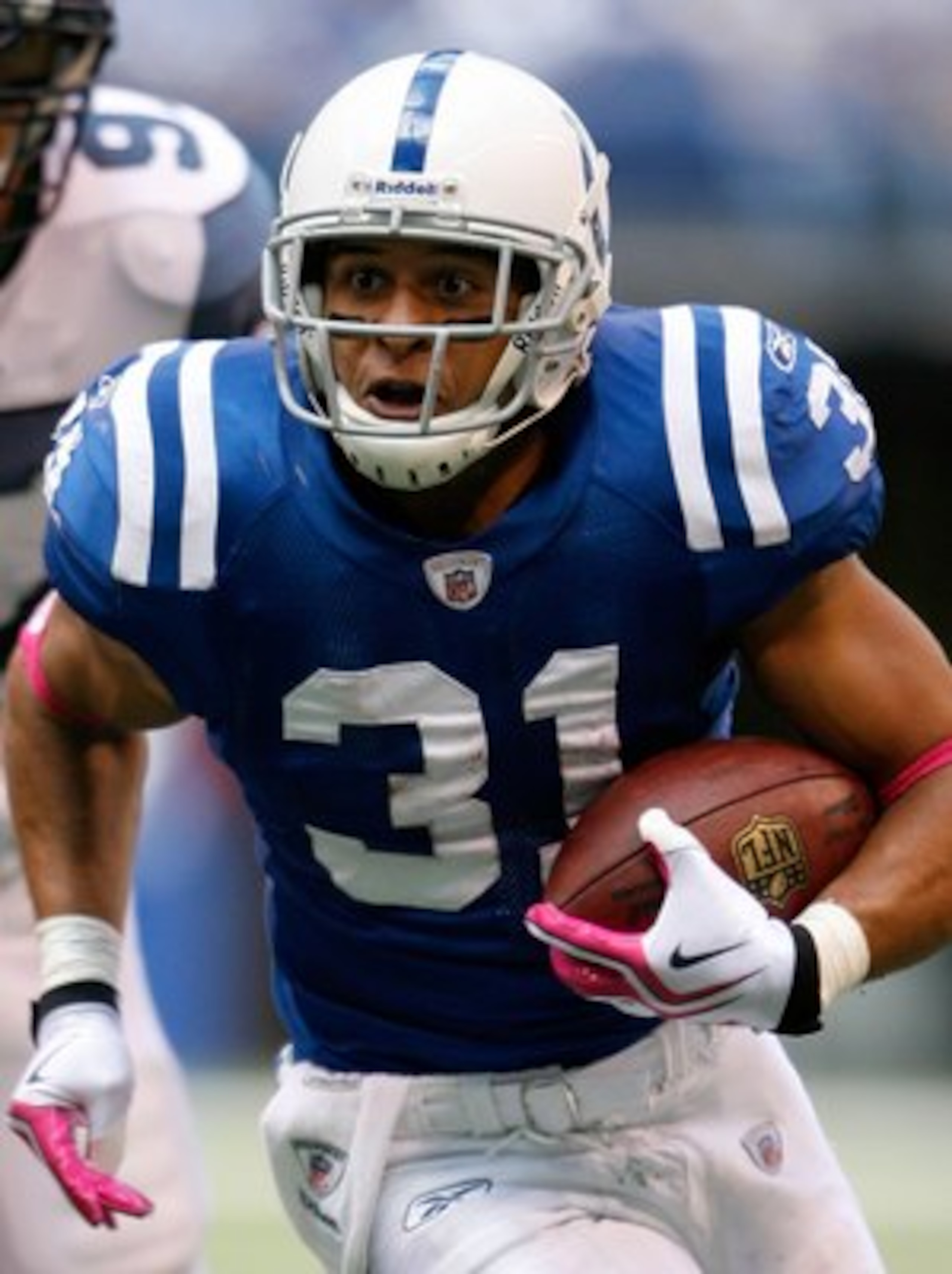 INDIANAPOLIS - OCTOBER 04:  Donald Brown #31 of the Indianapolis Colts runs with the ball during the NFL game against the Seattle Seahawks at Lucas Oil Stadium on October 4, 2009 in Indianapolis, Indiana. The Colts won 34-17.  (Photo by Andy Lyons/Getty I