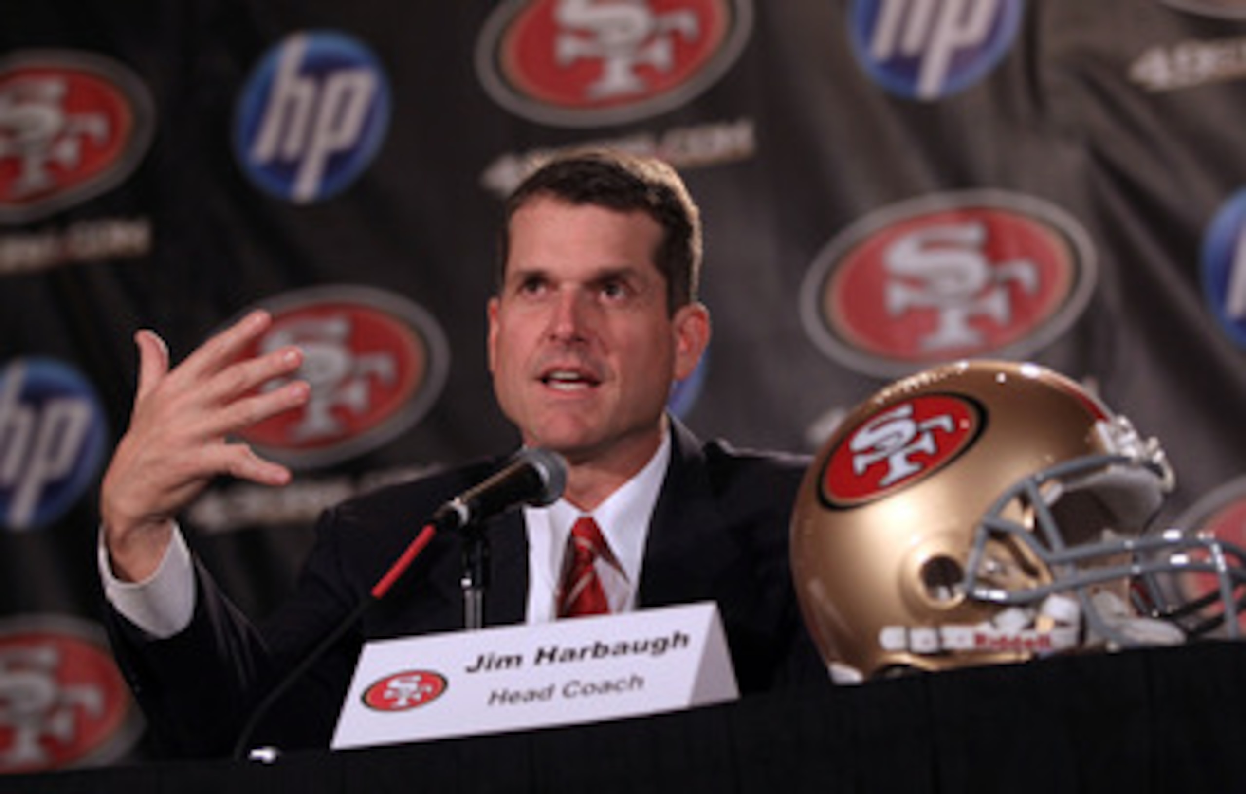 SAN FRANCISCO, CA - JANUARY 07:  Jim Harbaugh speaks at a press conference where he was introduced as the new San Francisco 49ers head coach at the Palace Hotel on January 7, 2011 in San Francisco, California.  (Photo by Ezra Shaw/Getty Images)