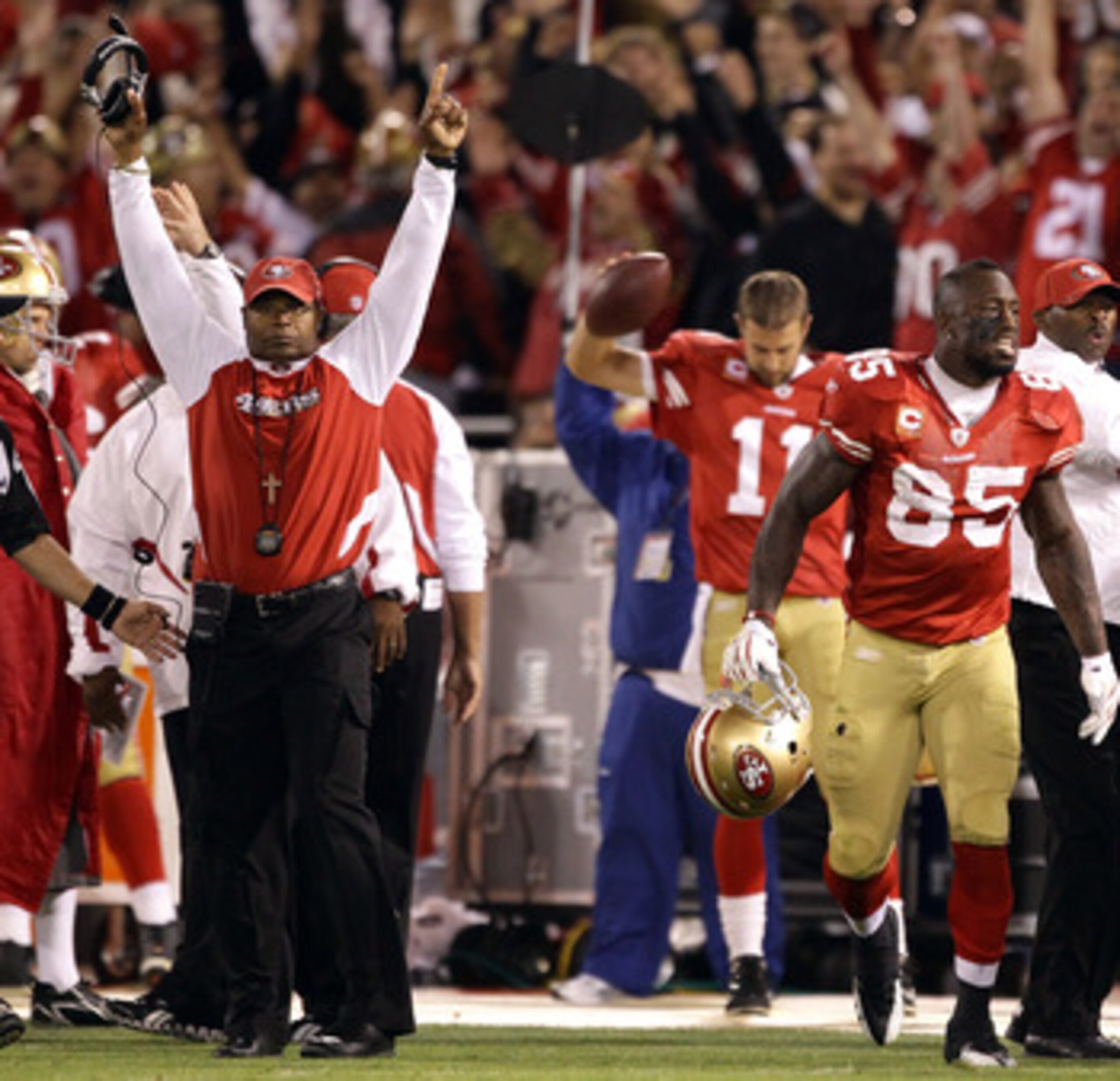 SAN FRANCISCO - SEPTEMBER 20:  Vernon Davis #85 and head coach Mike Singletary of the San Francisco 49ers celebrate a two-point conversion ruling was reversed in their favor due to instant replay during their game against the New Orleans Saints at Candles