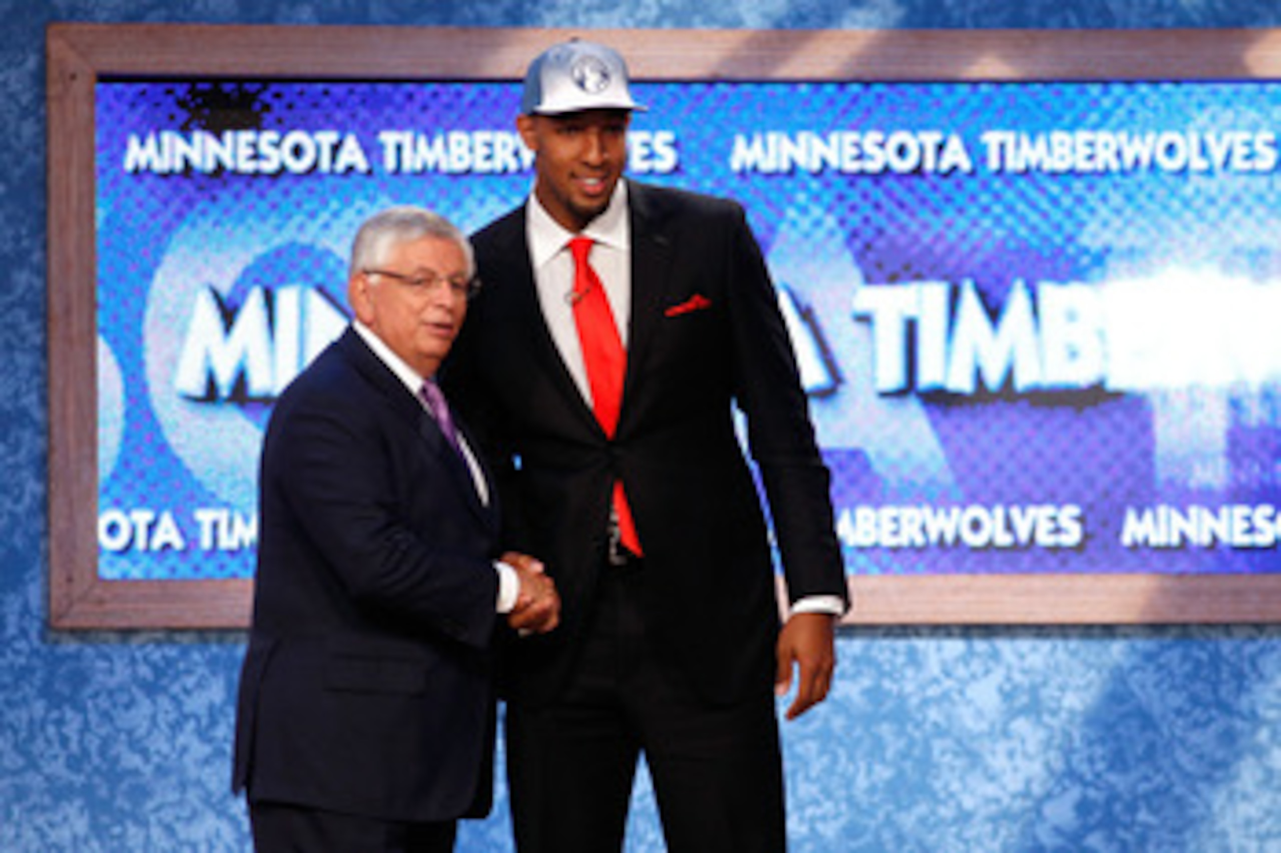 NEWARK, NJ - JUNE 23:  Derrick Williams (R) from Arizona greets NBA Commissioner David Stern after he was selected #2 overall by the Minnesota Timberwolves in the first round during the 2011 NBA Draft at the Prudential Center on June 23, 2011 in Newark, N