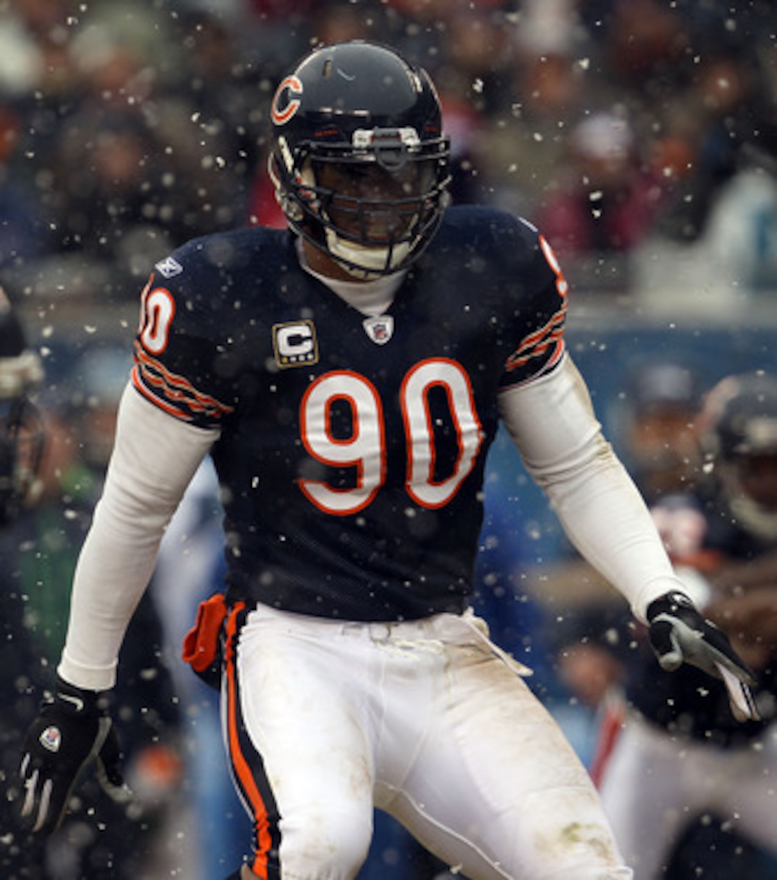 CHICAGO, IL - JANUARY 16:  Julius Peppers #90 of the Chicago Bears looks on against the Seattle Seahawks in the 2011 NFC divisional playoff game at Soldier Field on January 16, 2011 in Chicago, Illinois.  (Photo by Jonathan Daniel/Getty Images)