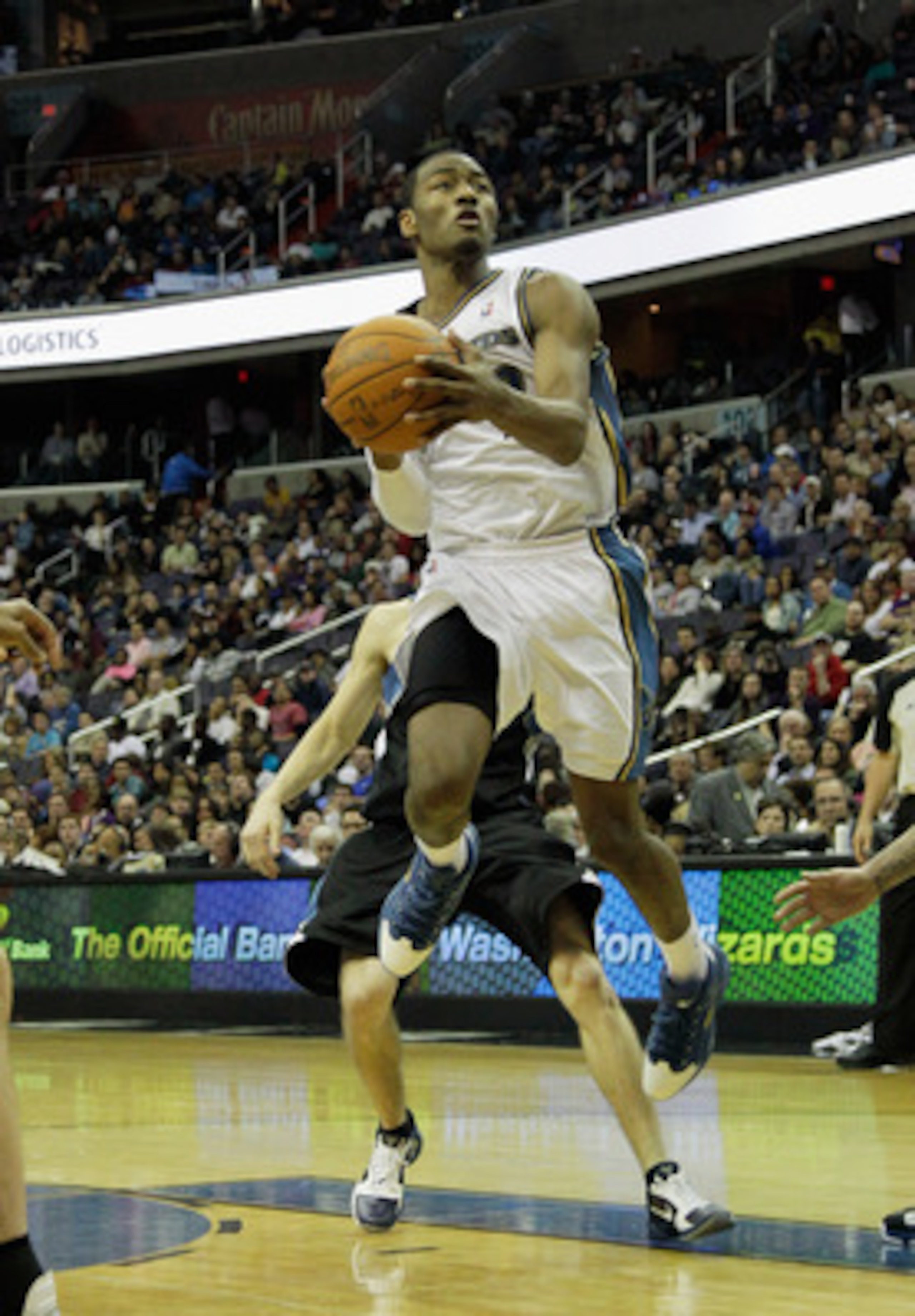 WASHINGTON, DC - MARCH 05:  John Wall #2 of the Washington Wizards puts up a shot against the Minnesota Timberwolves at the Verizon Center on March 5, 2011 in Washington, DC. NOTE TO USER: User expressly acknowledges and agrees that, by downloading and/or