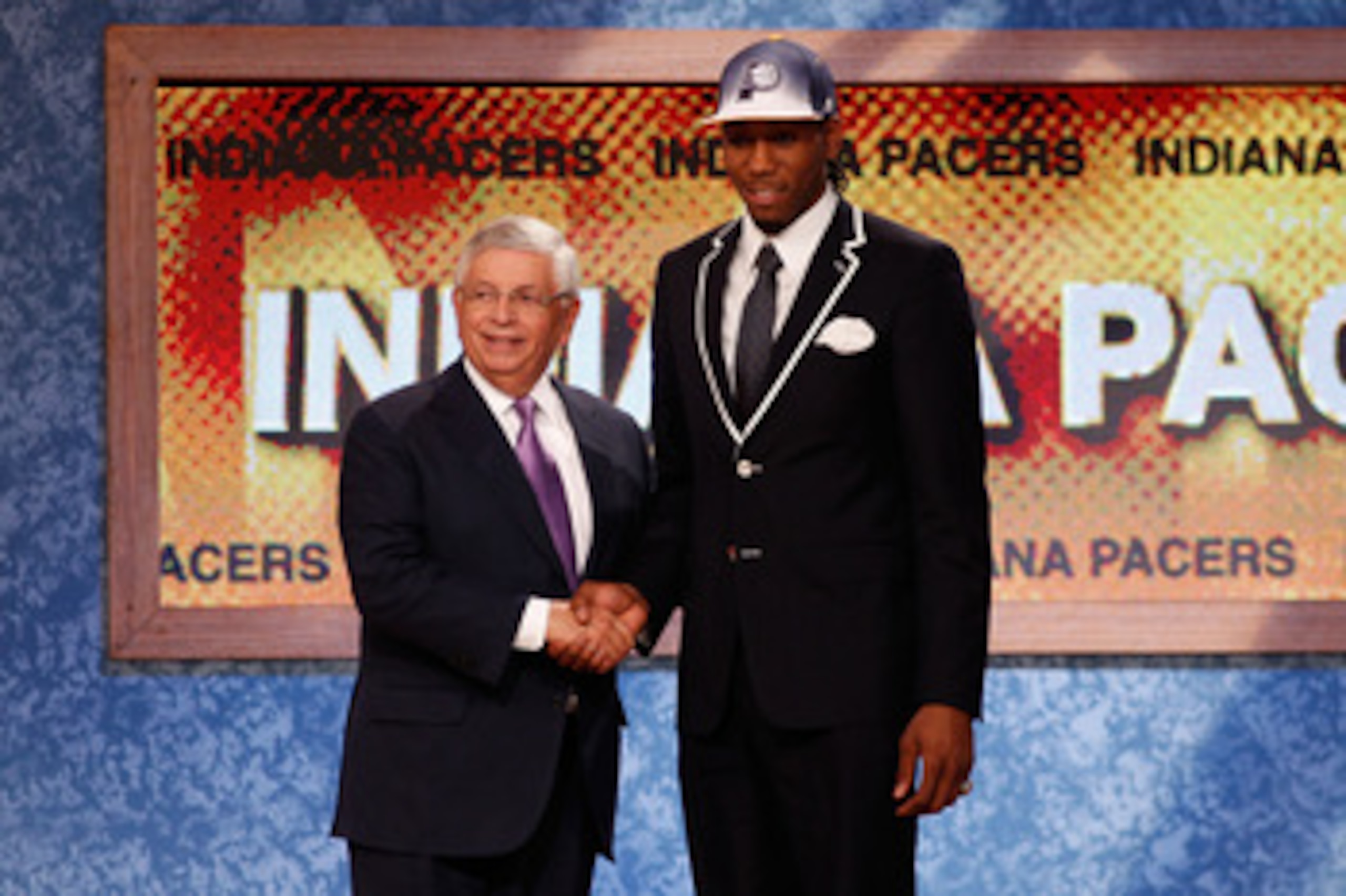 NEWARK, NJ - JUNE 23:  Kawhi Leonard from San Diego State greets NBA Commissioner David Stern after he was selected #15 overall by the Indiana Pacers in the first round during the 2011 NBA Draft at the Prudential Center on June 23, 2011 in Newark, New Jer