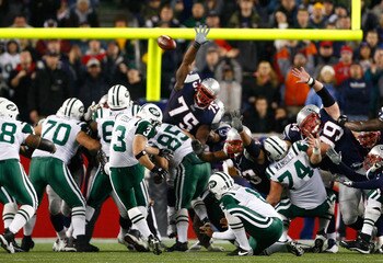 FOXBORO, MA - NOVEMBER 13:  Jay Feely #3 of the New York Jets kicks the game-winning field goal against the New England Patriots at Gillette Stadium on November 13, 2008 in Foxboro, Massachusetts. The Jets won 34-31 in overtime. (Photo by Jim Rogash/Getty