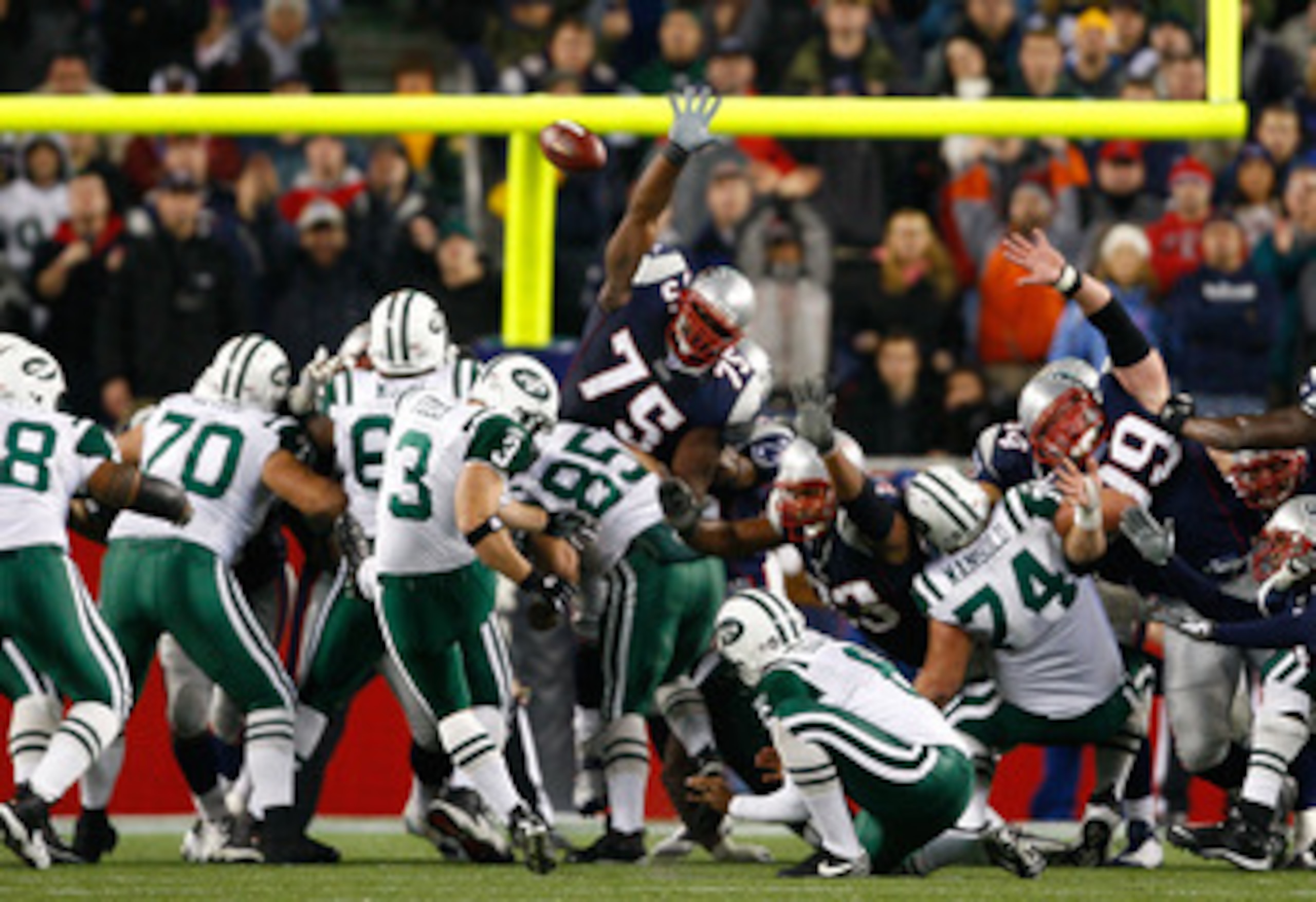 FOXBORO, MA - NOVEMBER 13:  Jay Feely #3 of the New York Jets kicks the game-winning field goal against the New England Patriots at Gillette Stadium on November 13, 2008 in Foxboro, Massachusetts. The Jets won 34-31 in overtime. (Photo by Jim Rogash/Getty