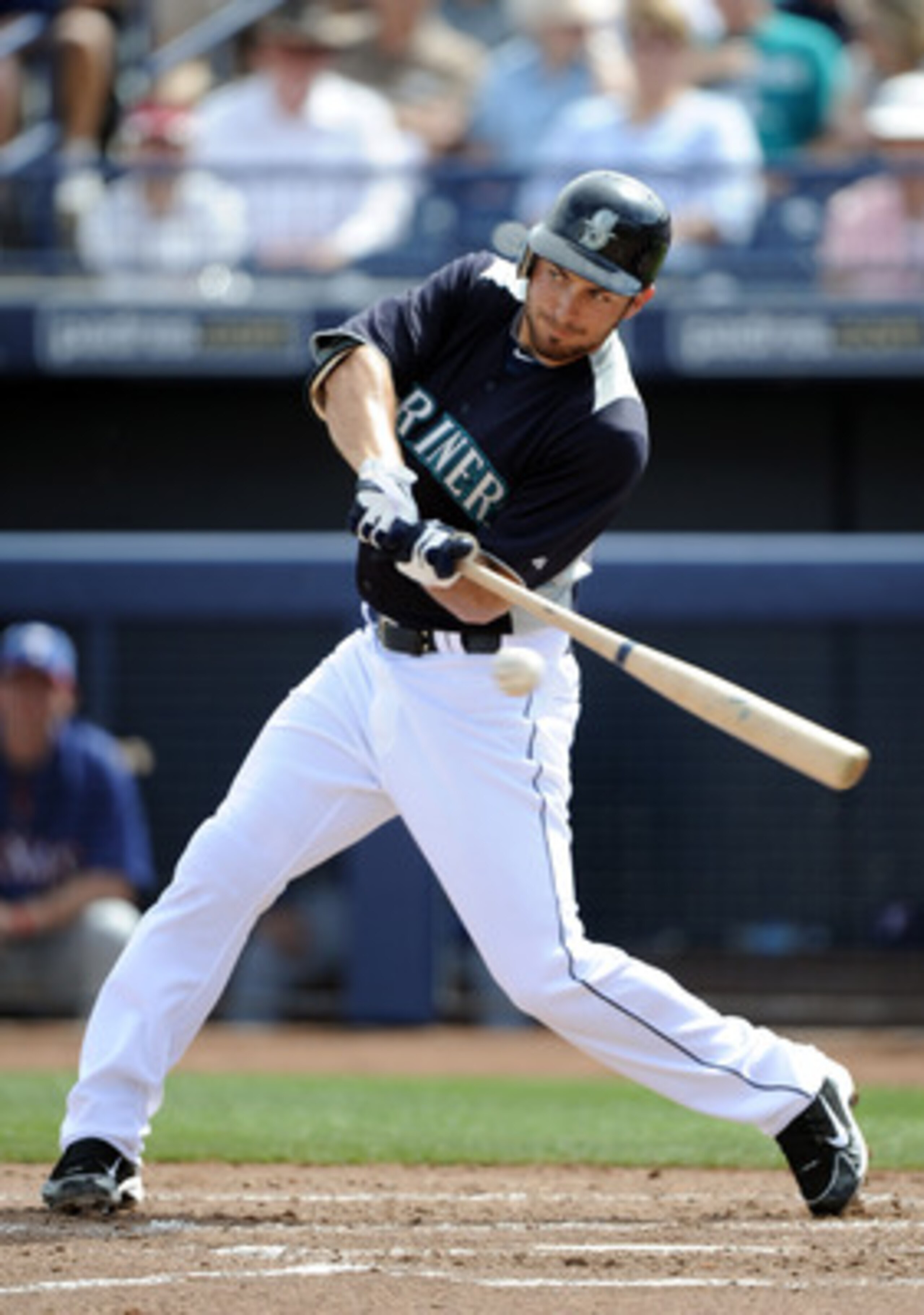 PEORIA, AZ - MARCH 01:  Dustin Ackley #13 of the  Seattle Mariners at bat against the Texas Rangers during spring training at Peoria Stadium on March 1, 2011 in Peoria, Arizona.  (Photo by Harry How/Getty Images)
