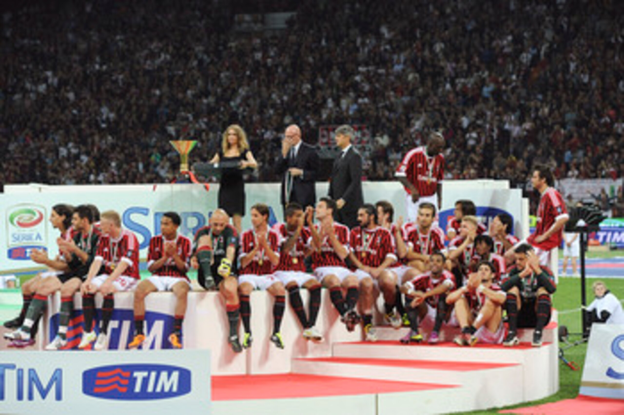 MILAN, ITALY - MAY 14:  Players of Milan during the awarding ceremony for the Italian Serie A championship after the Serie A match between AC Milan and Cagliari Calcio at Stadio Giuseppe Meazza on May 14, 2011 in Milan, Italy.  (Photo by Dino Panato/Getty