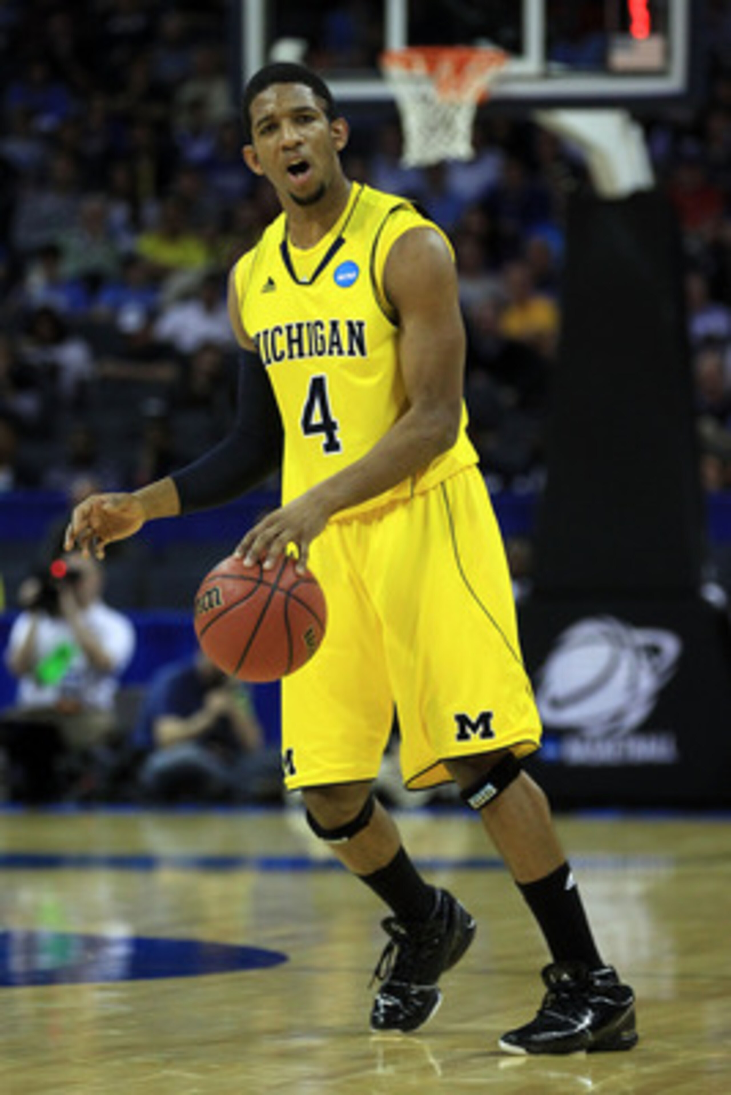CHARLOTTE, NC - MARCH 20: Darius Morris #4 of the Michigan Wolverines moves the ball while taking on the Duke Blue Devils during the third round of the 2011 NCAA men's basketball tournament at Time Warner Cable Arena on March 20, 2011 in Charlotte, North CHARLOTTE, NC - MARCH 20: Darius Morris #4 of the Michigan Wolverines moves the ball while taking on the Duke Blue Devils during the third round of the 2011 NCAA men's basketball tournament at Time Warner Cable Arena on March 20, 2011 in Charlotte, North