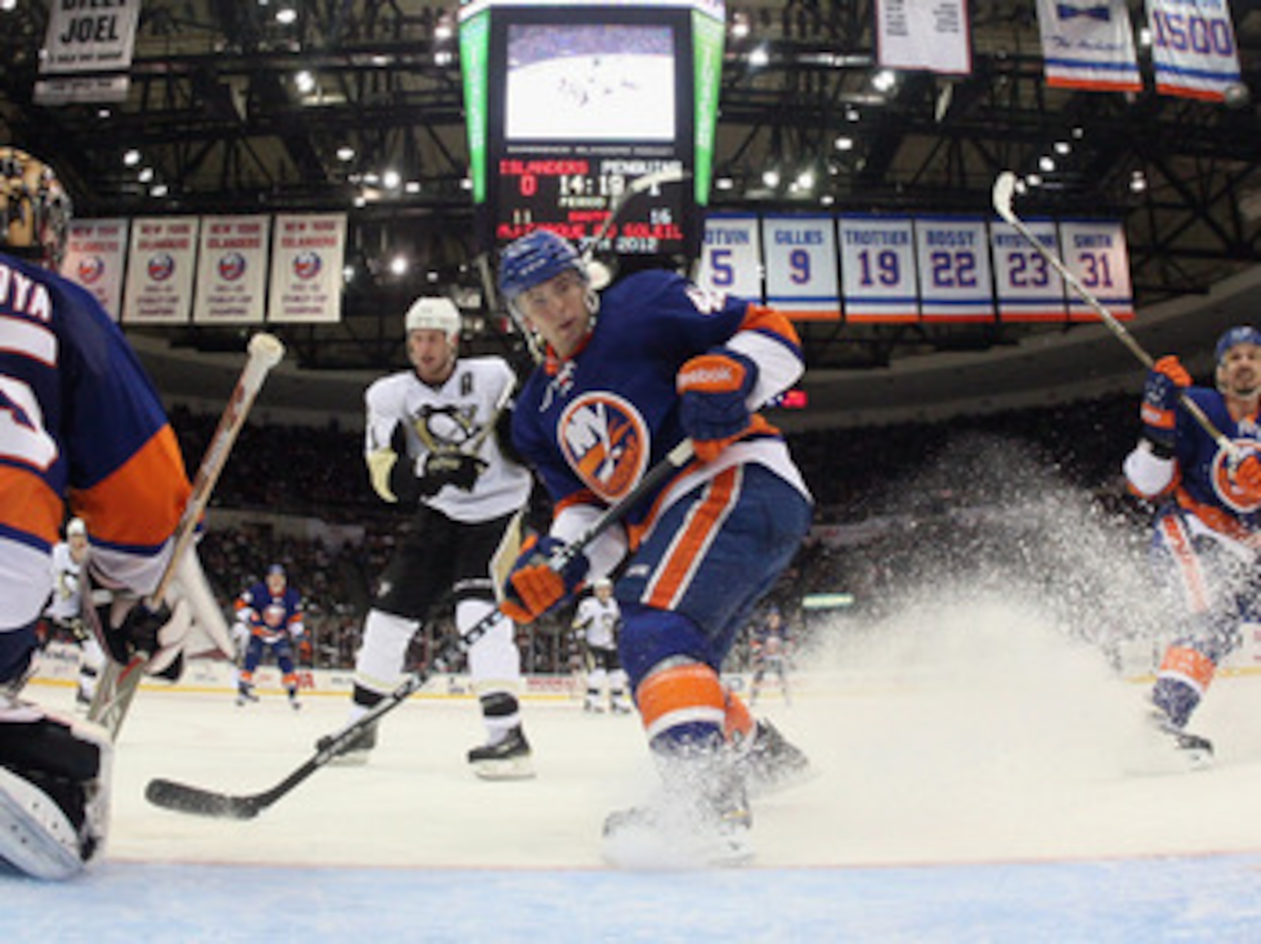 UNIONDALE, NY - APRIL 08:  Dylan Reese #42 of the New York Islanders skates against the Pittsburgh Penguins at the Nassau Coliseum on April 8, 2011 in Uniondale, New York.  (Photo by Bruce Bennett/Getty Images)
