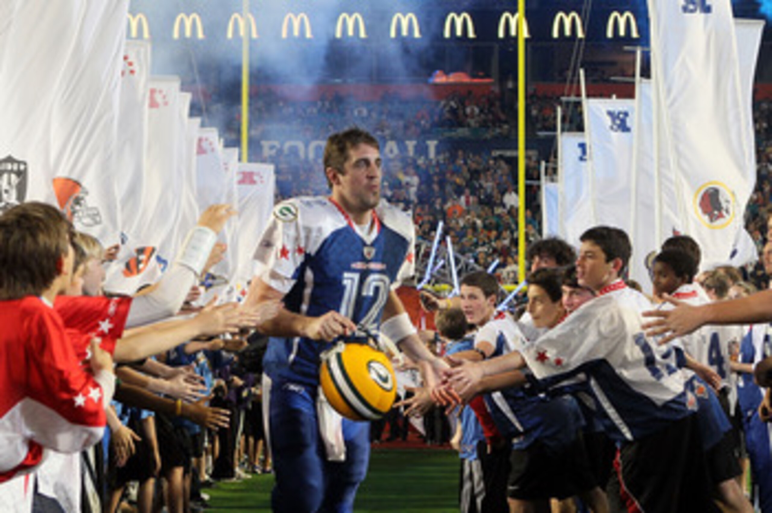 MIAMI GARDENS, FL - JANUARY 31:  Aaron Rodgers of the Green Bay Packers takes the field during the 2010 AFC-NFC Pro Bowl at Sun Life Stadium on January 31, 2010 in Miami Gardens, Florida.  (Photo by Scott Halleran/Getty Images)