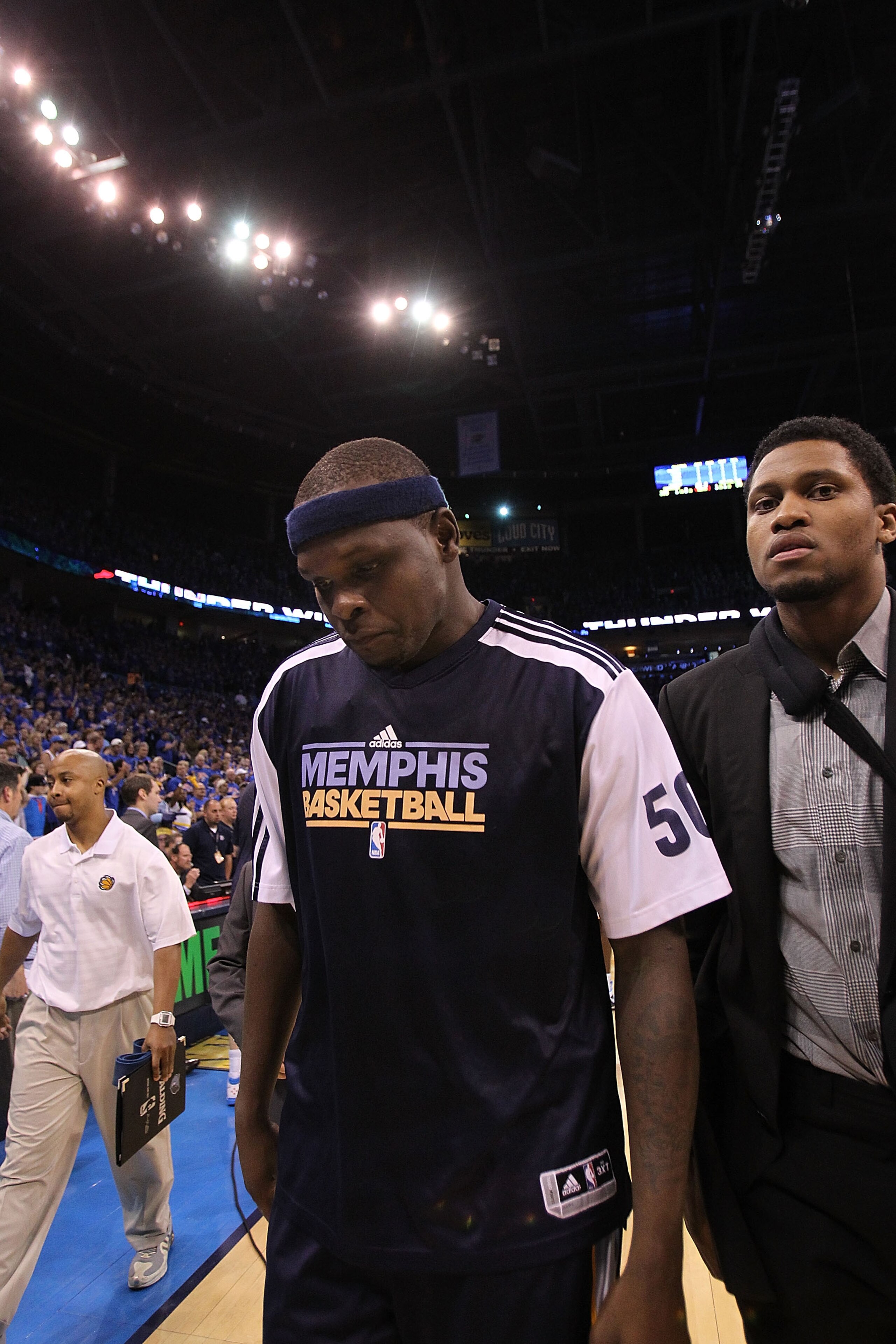 OKLAHOMA CITY, OK - MAY 15:  (L-R) Forward Zach Randolph #50 and Rudy Gay walk off the court after a 90-105 loss against the Oklahoma City Thunder in Game Seven of the Western Conference Semifinals in the 2011 NBA Playoffs on May 15, 2011 at Oklahoma City