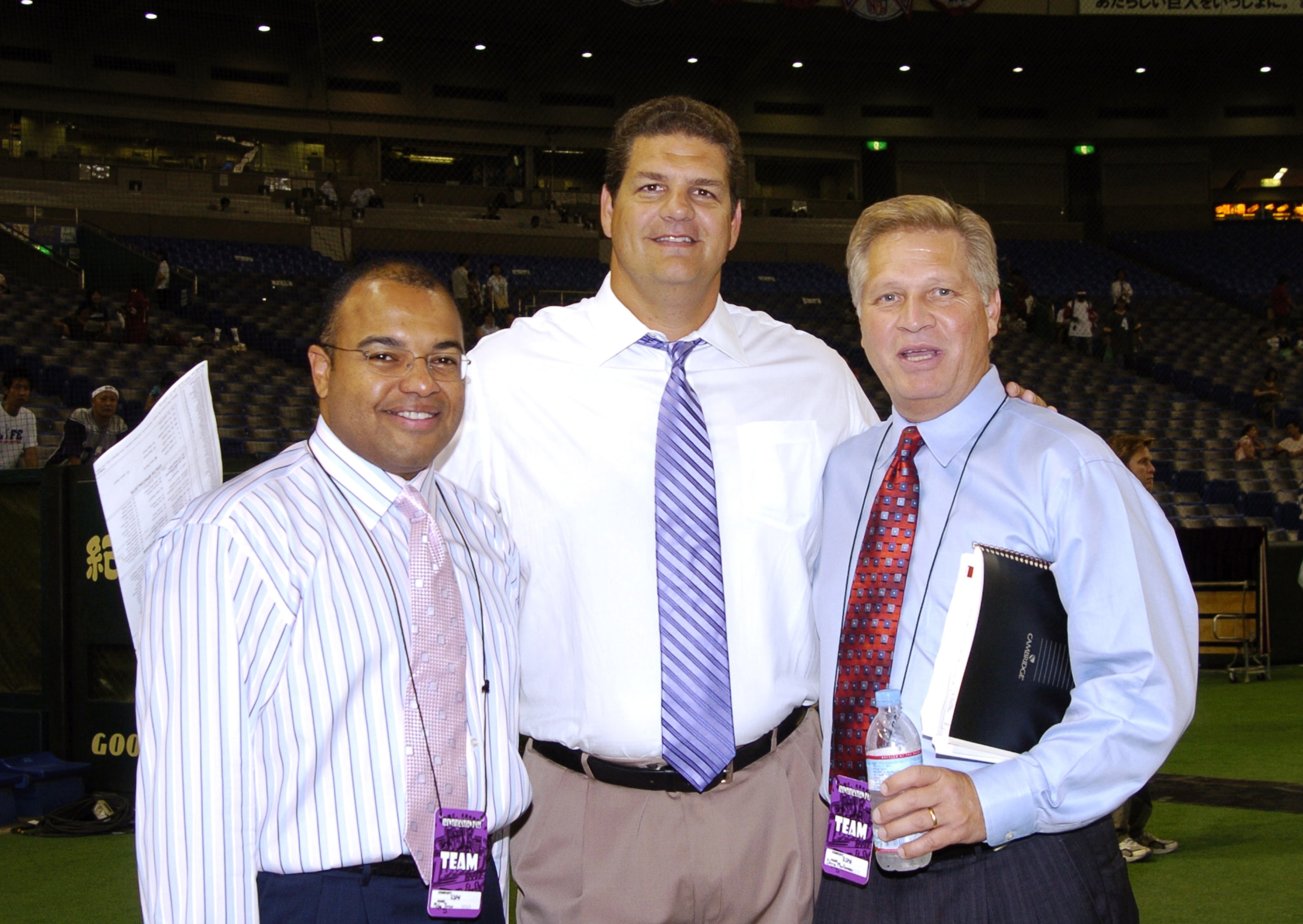 ESPN television crew is set to broadcast  the 2005 American Bowl  Aug. 6    at the Tokyo Dome  in Japan.   Mike Tirico (left), Mike Golic and Chris Mortensen (right) watched the Atlanta   Falcons defeat the Indianapolis  Colts 27 - 21.  (Photo by Al Messe