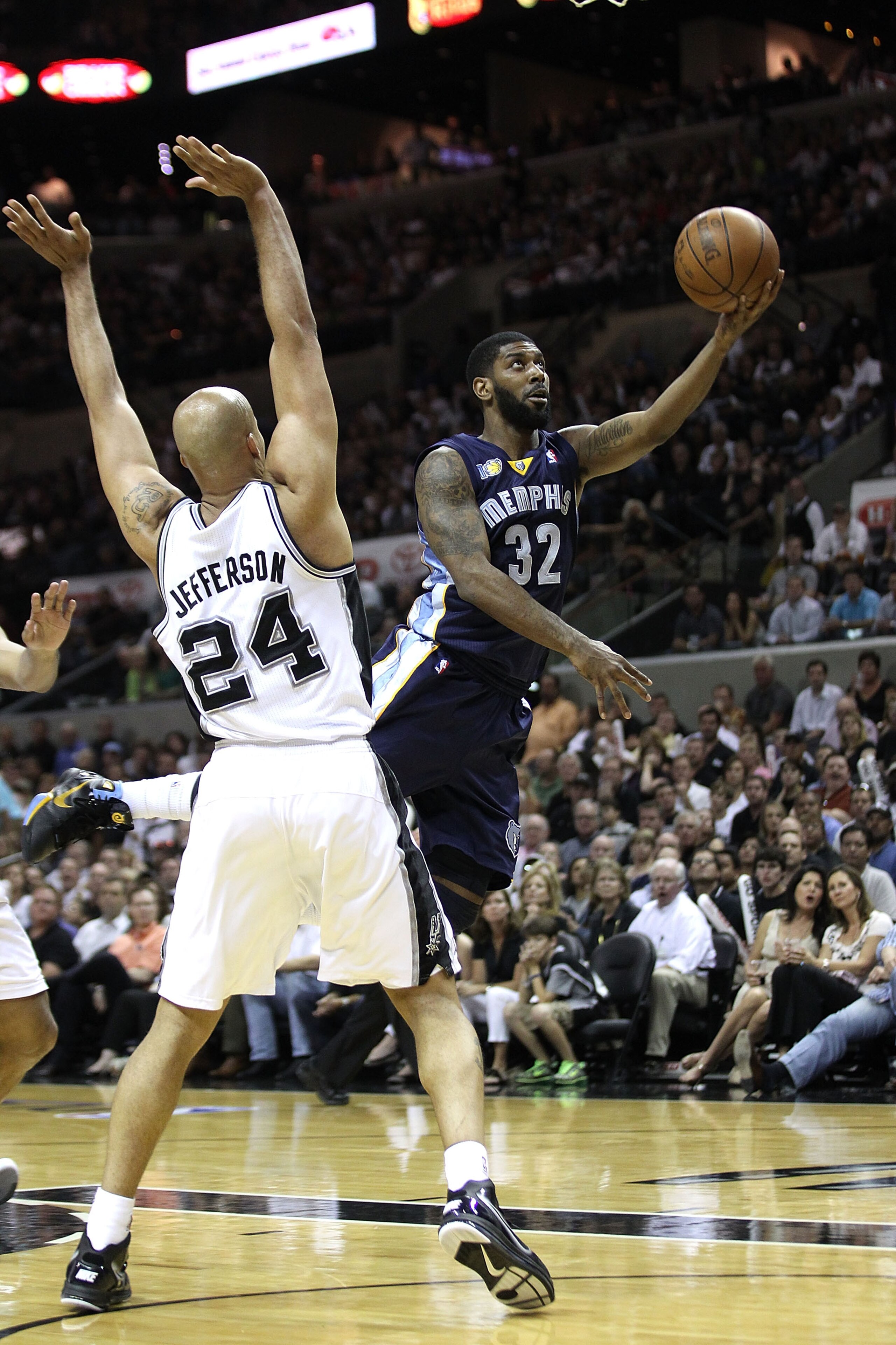 SAN ANTONIO, TX - APRIL 27:  O.J. Mayo #32 of the Memphis Grizzlies shoots against Richard Jefferson #24 of the San Antionio Spurs in Game Five of the Western Conference Quarterfinals in the 2011 NBA Playoffs on April 27, 2011 at AT&T Center in San Antoni