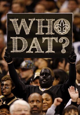 NEW ORLEANS - NOVEMBER 30: A New orleans Saints fan holds a sign in support of his team before the game against the New England Patriots at Louisana Superdome on November 30, 2009 in New Orleans, Louisiana. (Photo by Chris Graythen/Getty Images)