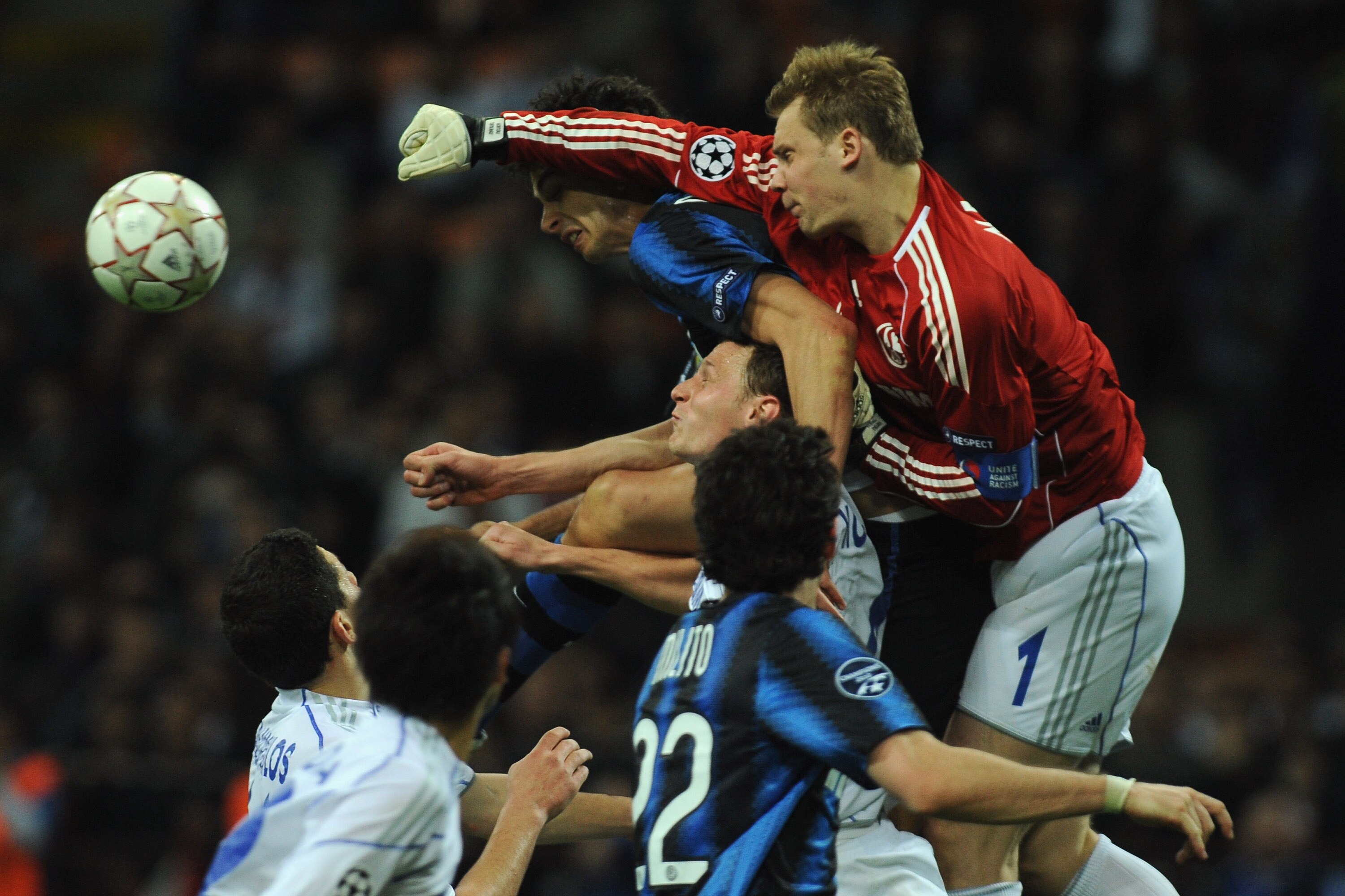 MILAN, ITALY - APRIL 05:  Manuel Neuer of Schalke 04 in action against Andrea Ranocchia of FC Internazionale Milano during the UEFA Champions League Quarter Final match between FC Internazionale Milano and Schalke 04 at San Siro Stadium on April 5, 2011 i