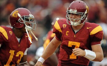 LOS ANGELES, CA - OCTOBER 16:  Matt Barkley #7 and Robert Woods #13 of the USC Trojans celebrate a touchdown for a 28-0 lead over the California Golden Bears during the second quarter at Los Angeles Memorial Coliseum on October 16, 2010 in Los Angeles, Ca