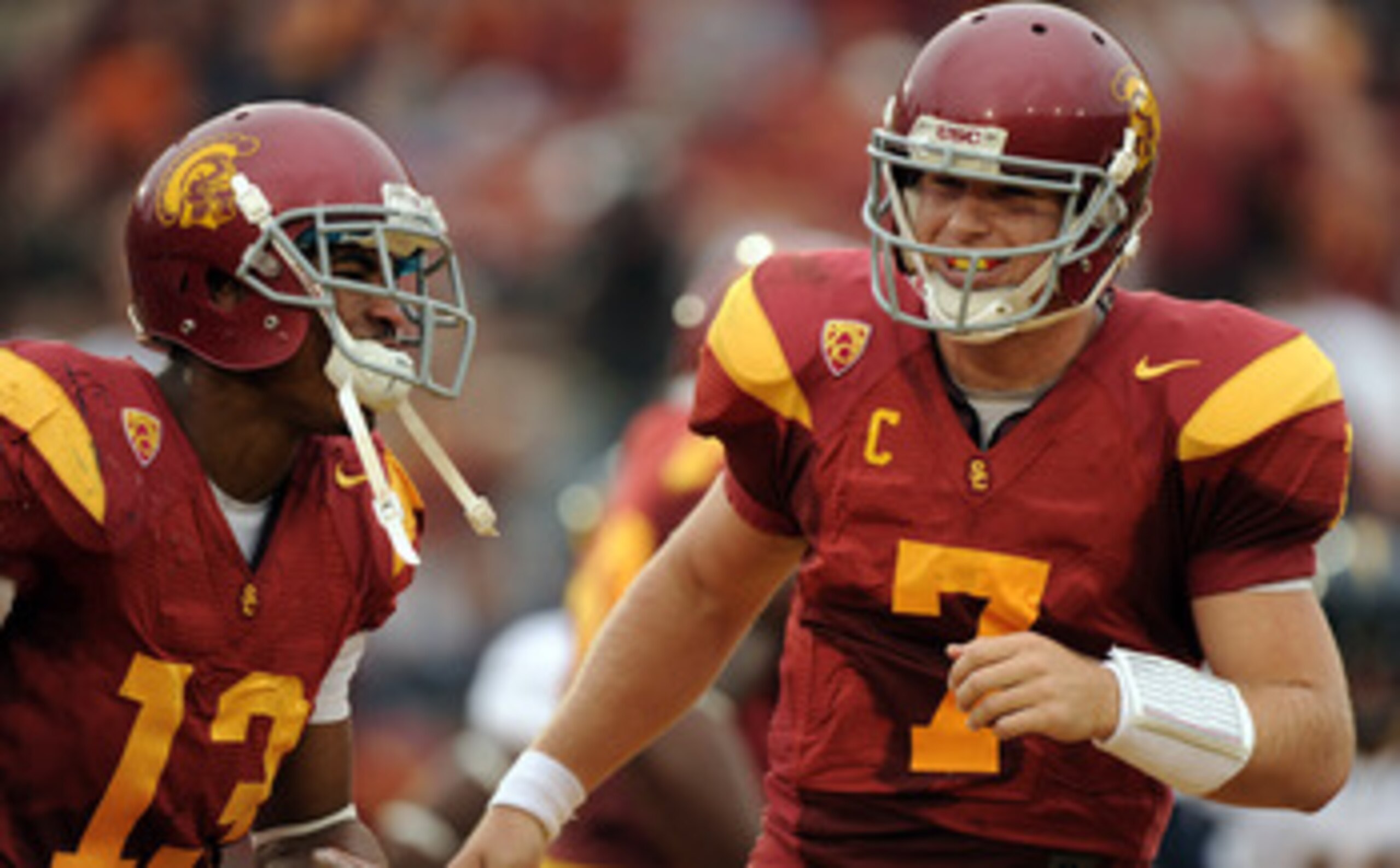 LOS ANGELES, CA - OCTOBER 16:  Matt Barkley #7 and Robert Woods #13 of the USC Trojans celebrate a touchdown for a 28-0 lead over the California Golden Bears during the second quarter at Los Angeles Memorial Coliseum on October 16, 2010 in Los Angeles, Ca
