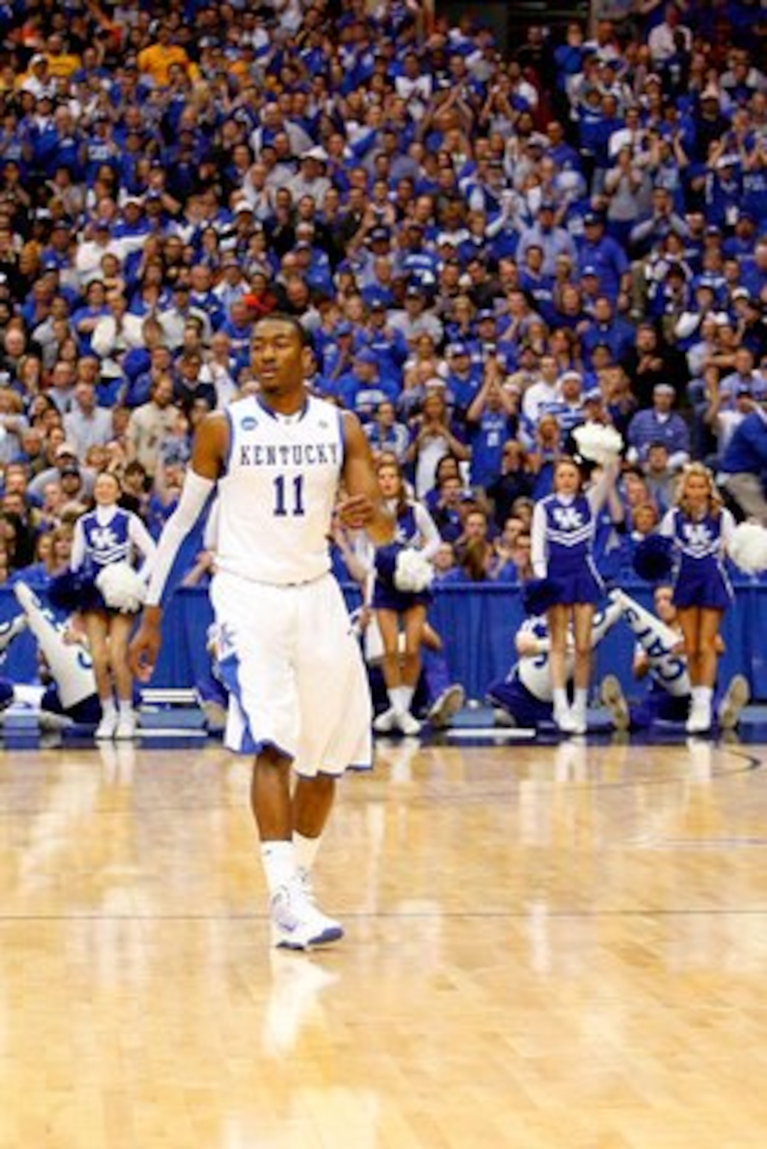 SYRACUSE, NY - MARCH 27:  John Wall #11 of the Kentucky Wildcats stands on court against the West Virginia Mountaineers during the east regional final of the 2010 NCAA men's basketball tournament at the Carrier Dome on March 27, 2010 in Syracuse, New York