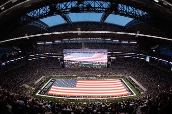 ARLINGTON, TX - SEPTEMBER 20:  An American flag on the field before a game between the New York Giants and the Dallas Cowboys at Cowboys Stadium on September 20, 2009 in Arlington, Texas.  (Photo by Ronald Martinez/Getty Images)