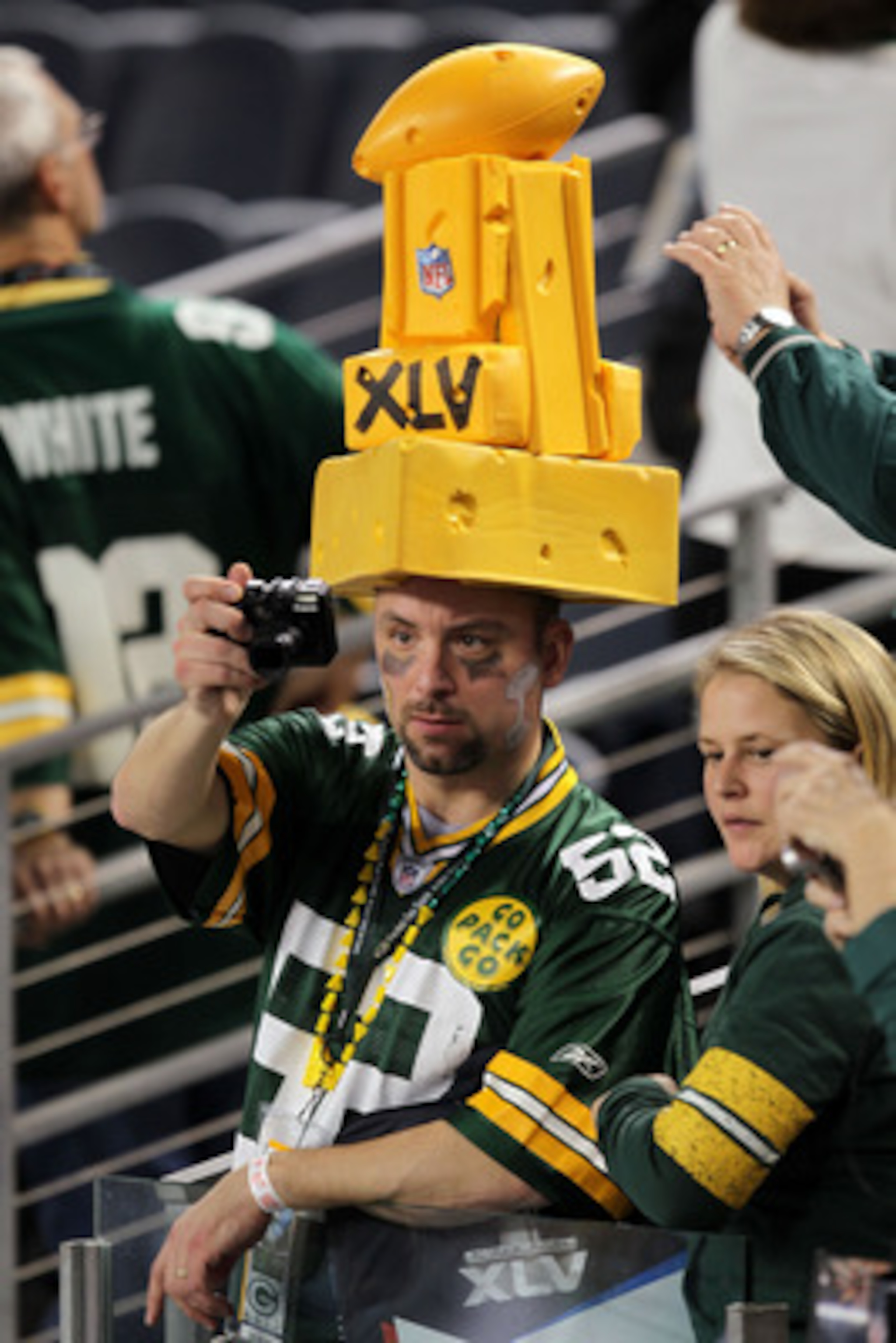 ARLINGTON, TX - FEBRUARY 06:  Green Bay Packers fans celebrate after winning Super Bowl XLV 31-25 against the Pittsburgh Steelers at Cowboys Stadium on February 6, 2011 in Arlington, Texas.  (Photo by Mike Ehrmann/Getty Images)