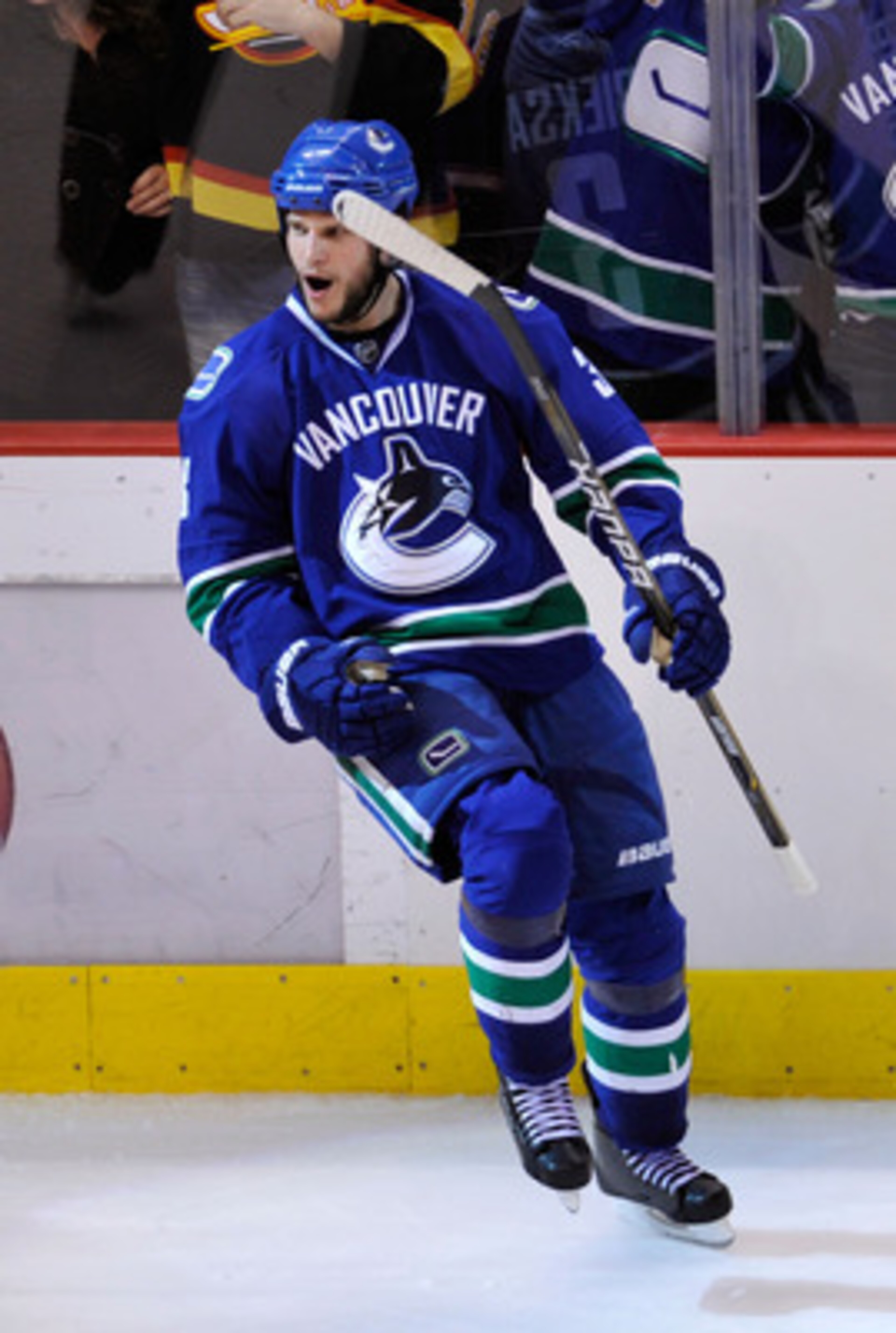 VANCOUVER, CANADA - MAY 15:  Kevin Bieksa #3 of the Vancouver Canucks celebrates his third period goal to tie the game at 2-2 against the San Jose Sharks in Game One of the Western Conference Finals during the 2011 Stanley Cup Playoffs at Rogers Arena on 