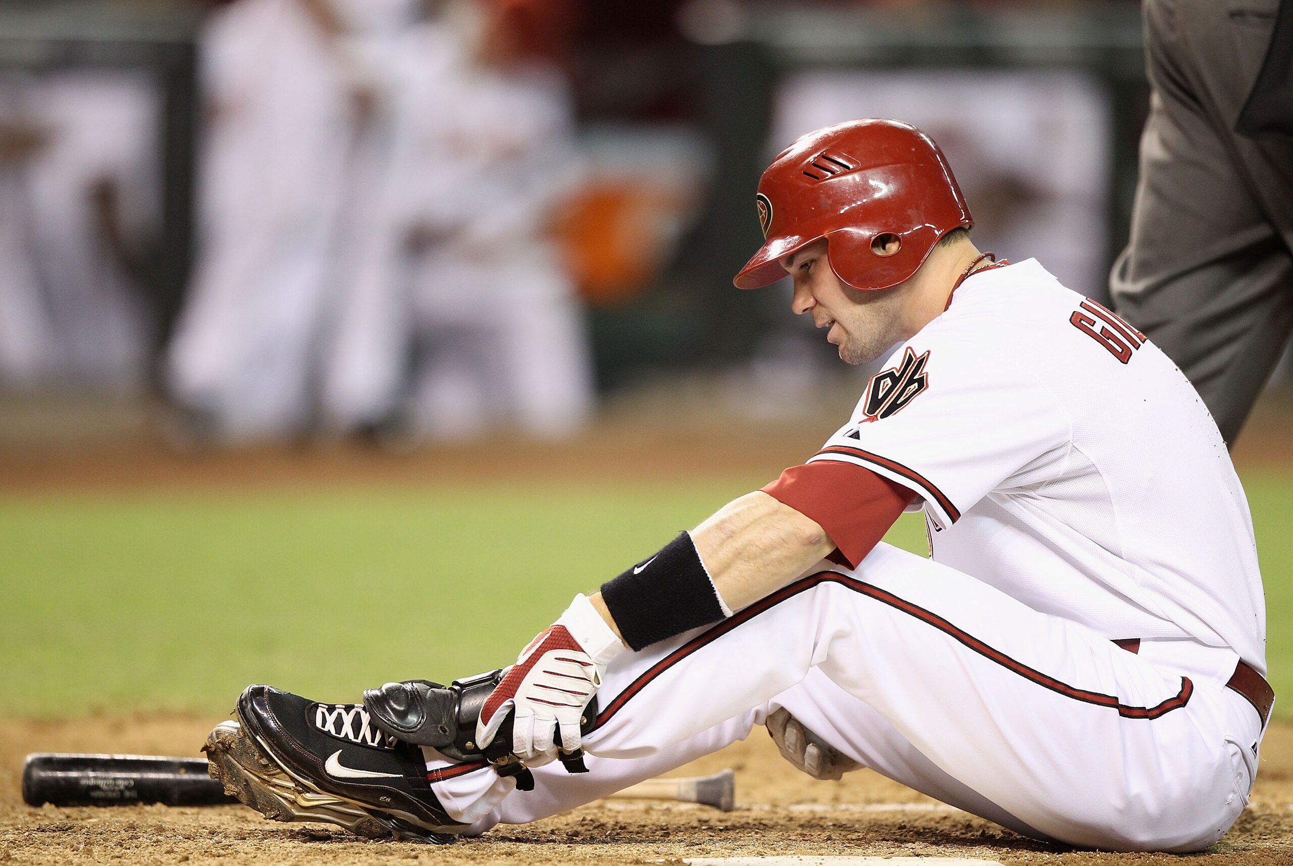 PHOENIX - JULY 08: Cole Gillespie #5 of the Arizona Diamondbacks reacts after being hit by a foul ball during the Major League Baseball game against the Florida Marlins at Chase Field on July 8, 2010 in Phoenix, Arizona. (Photo by Christian Petersen/Gett PHOENIX - JULY 08: Cole Gillespie #5 of the Arizona Diamondbacks reacts after being hit by a foul ball during the Major League Baseball game against the Florida Marlins at Chase Field on July 8, 2010 in Phoenix, Arizona. (Photo by Christian Petersen/Gett