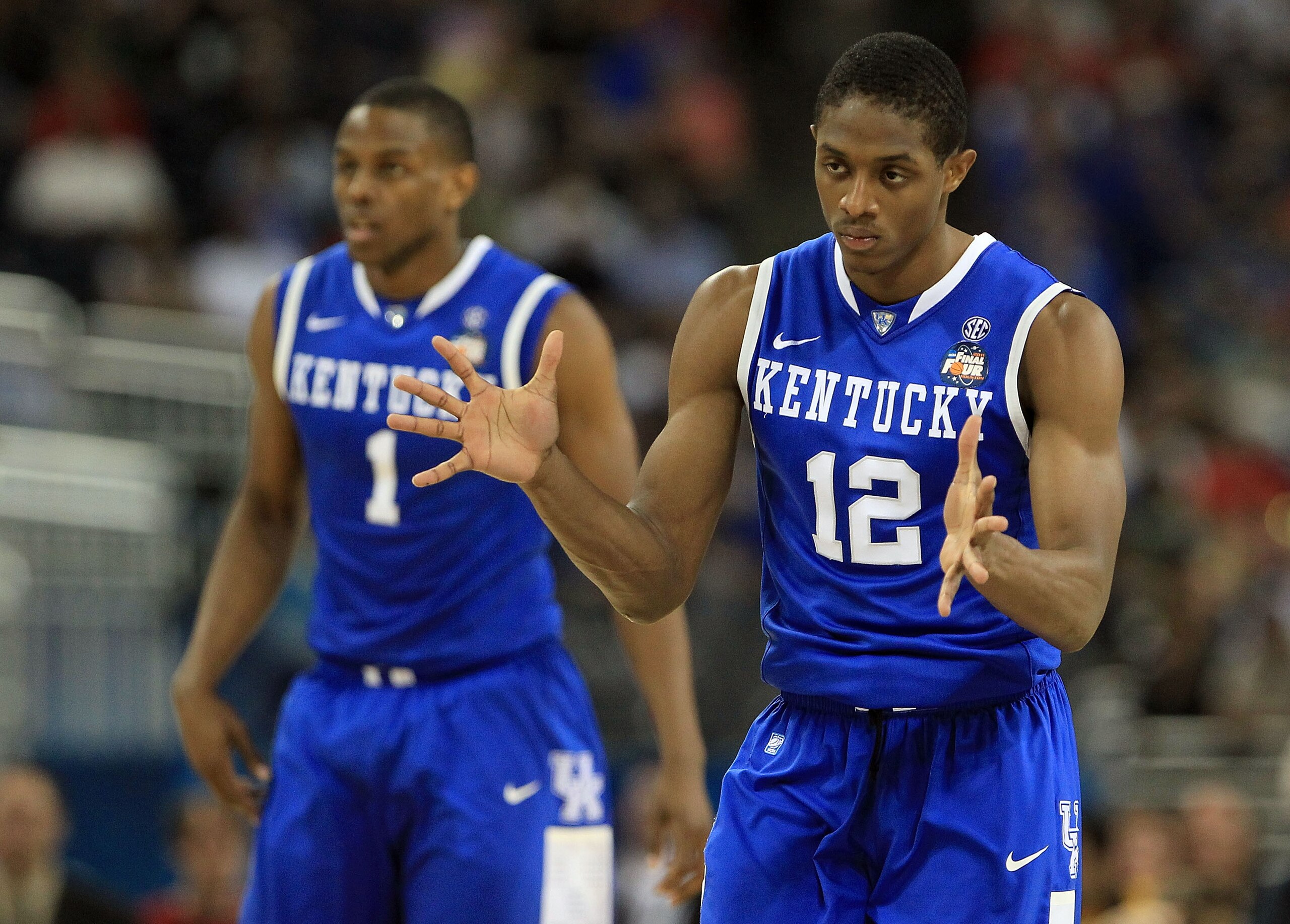 HOUSTON, TX - APRIL 02:  Brandon Knight #12 of the Kentucky Wildcats reacts against the Connecticut Huskies during the National Semifinal game of the 2011 NCAA Division I Men's Basketball Championship at Reliant Stadium on April 2, 2011 in Houston, Texas.