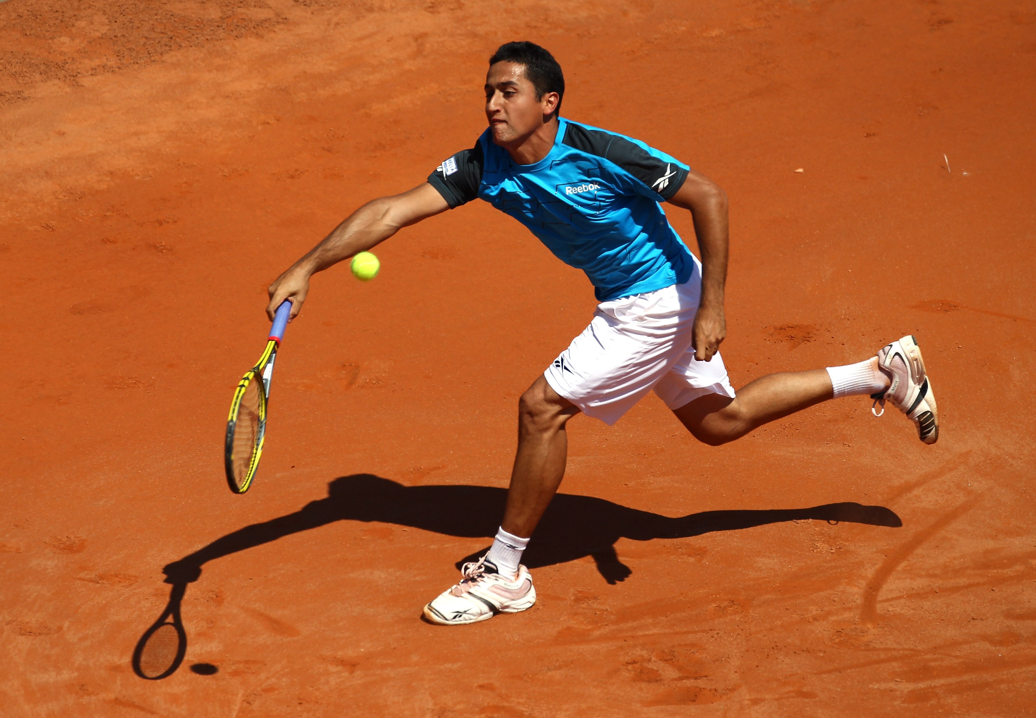 ROME, ITALY - MAY 10:  Nicolas Almagro of Spain plays a forehand return during the his first round match against Simone Bolelli of Italy during day three of the Internazionali BNL d'Italia at the Foro Italico Tennis Centre on May 10, 2011 in Rome, Italy.