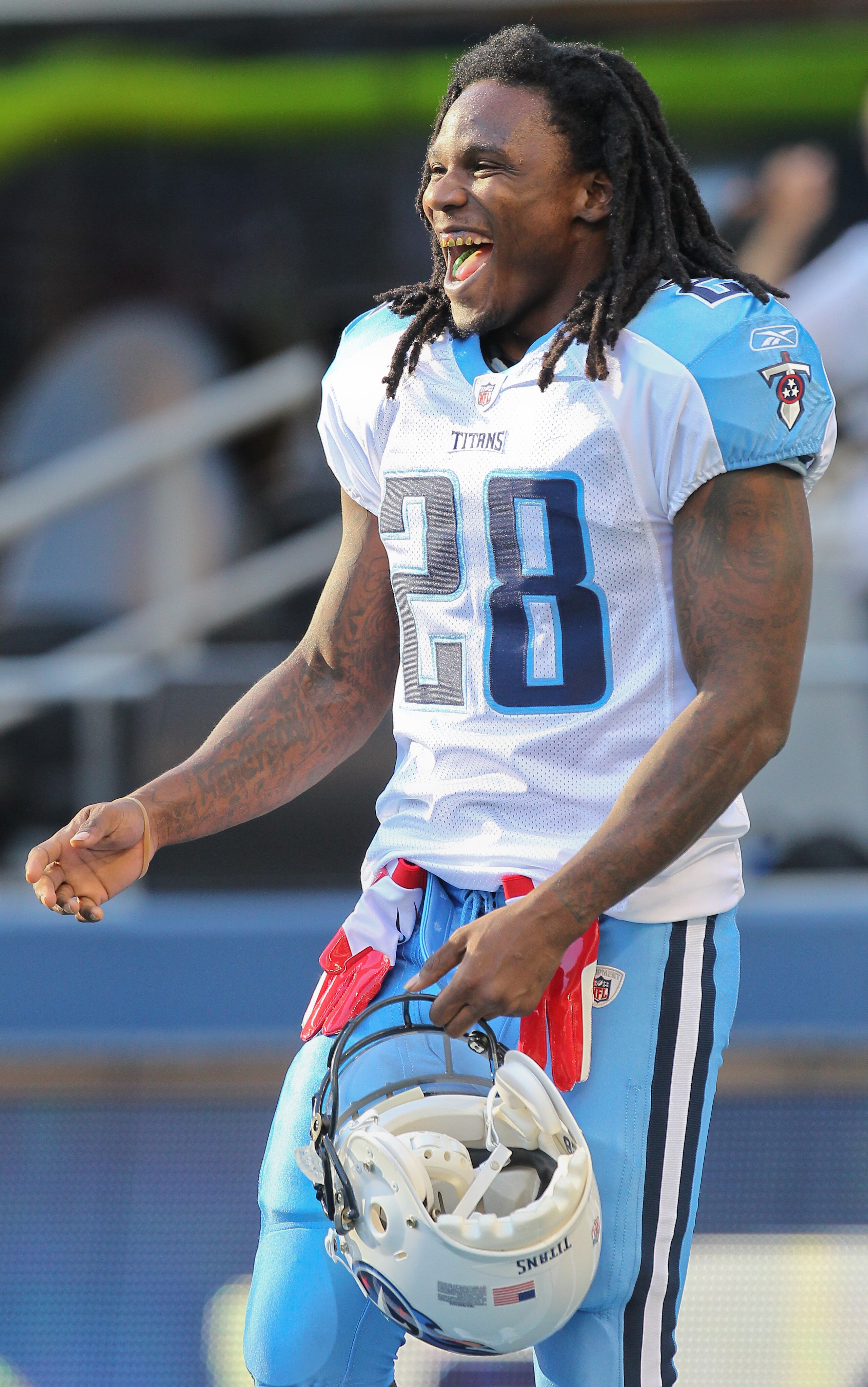 SEATTLE - AUGUST 14: Running back Chris Johnson #28 of the Tennessee Titans smiles prior to the preseason game against the Seattle Seahawks at Qwest Field on August 14, 2010 in Seattle, Washington. (Photo by Otto Greule Jr/Getty Images) SEATTLE - AUGUST 14: Running back Chris Johnson #28 of the Tennessee Titans smiles prior to the preseason game against the Seattle Seahawks at Qwest Field on August 14, 2010 in Seattle, Washington. (Photo by Otto Greule Jr/Getty Images)