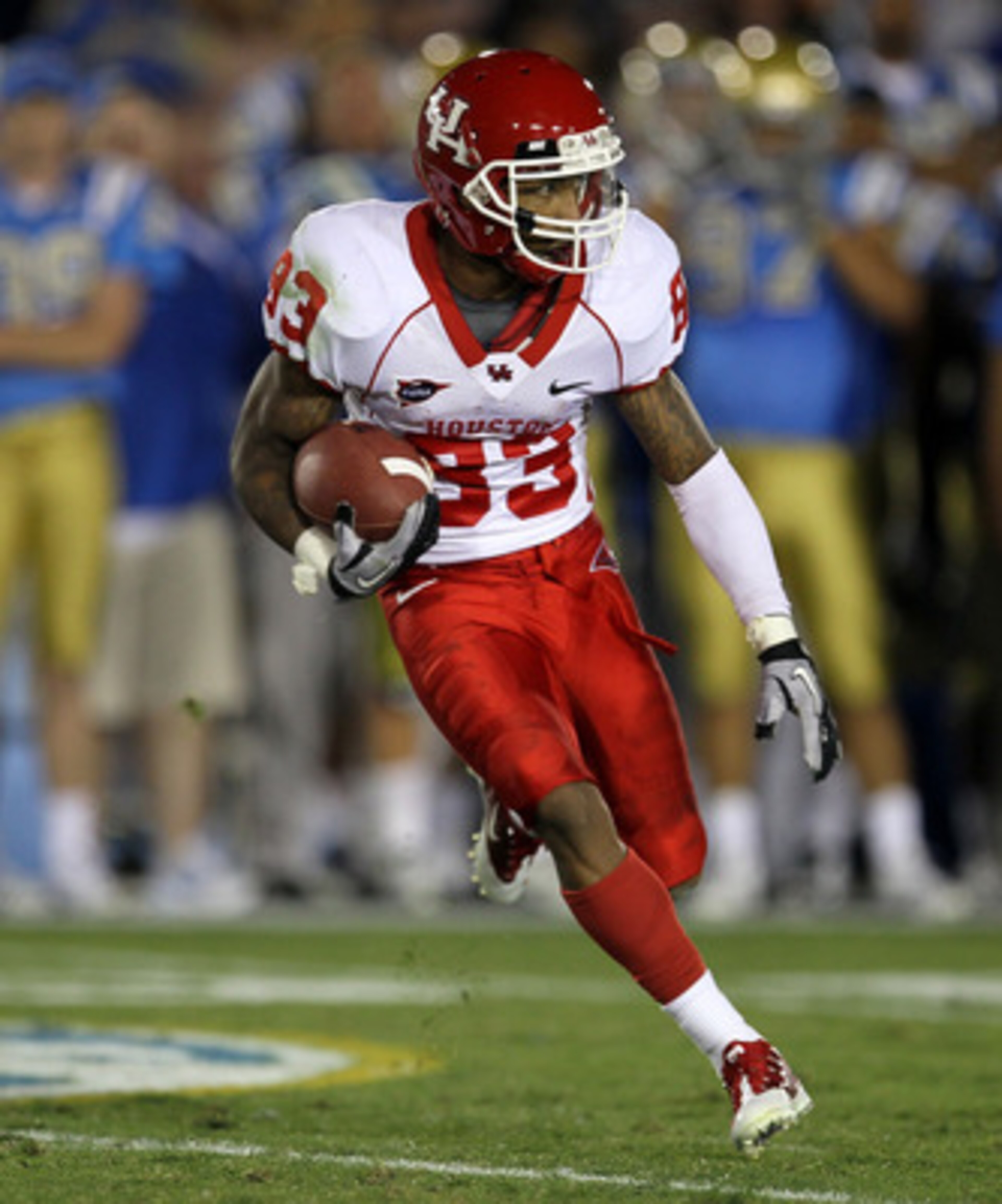 PASADENA, CA - SEPTEMBER 18: Wide receiver Patrick Edwards #83 of the Houston Cougars carries the ball against the UCLA Bruins at the Rose Bowl on September 18, 2010 in Pasadena, California. UCLA won 31-13. (Photo by Stephen Dunn/Getty Images) PASADENA, CA - SEPTEMBER 18: Wide receiver Patrick Edwards #83 of the Houston Cougars carries the ball against the UCLA Bruins at the Rose Bowl on September 18, 2010 in Pasadena, California. UCLA won 31-13. (Photo by Stephen Dunn/Getty Images)
