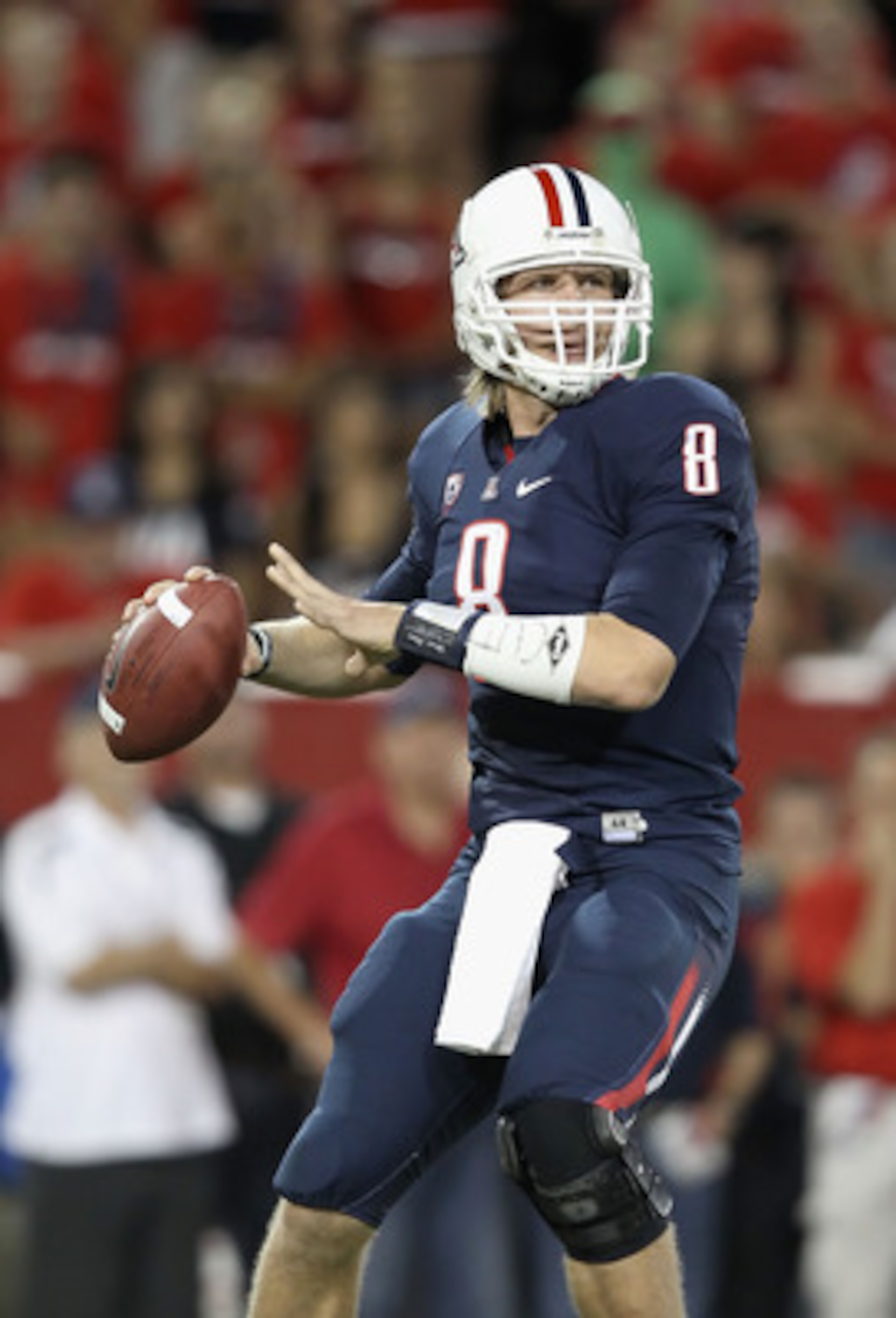 TUCSON, AZ - OCTOBER 09:  Quarterback Nick Foles #8 of the Arizona Wildcats drops back to pass during the college football game against the Oregon State Beavers at Arizona Stadium on October 9, 2010 in Tucson, Arizona.  The Beavers defeated the Wildcats 2