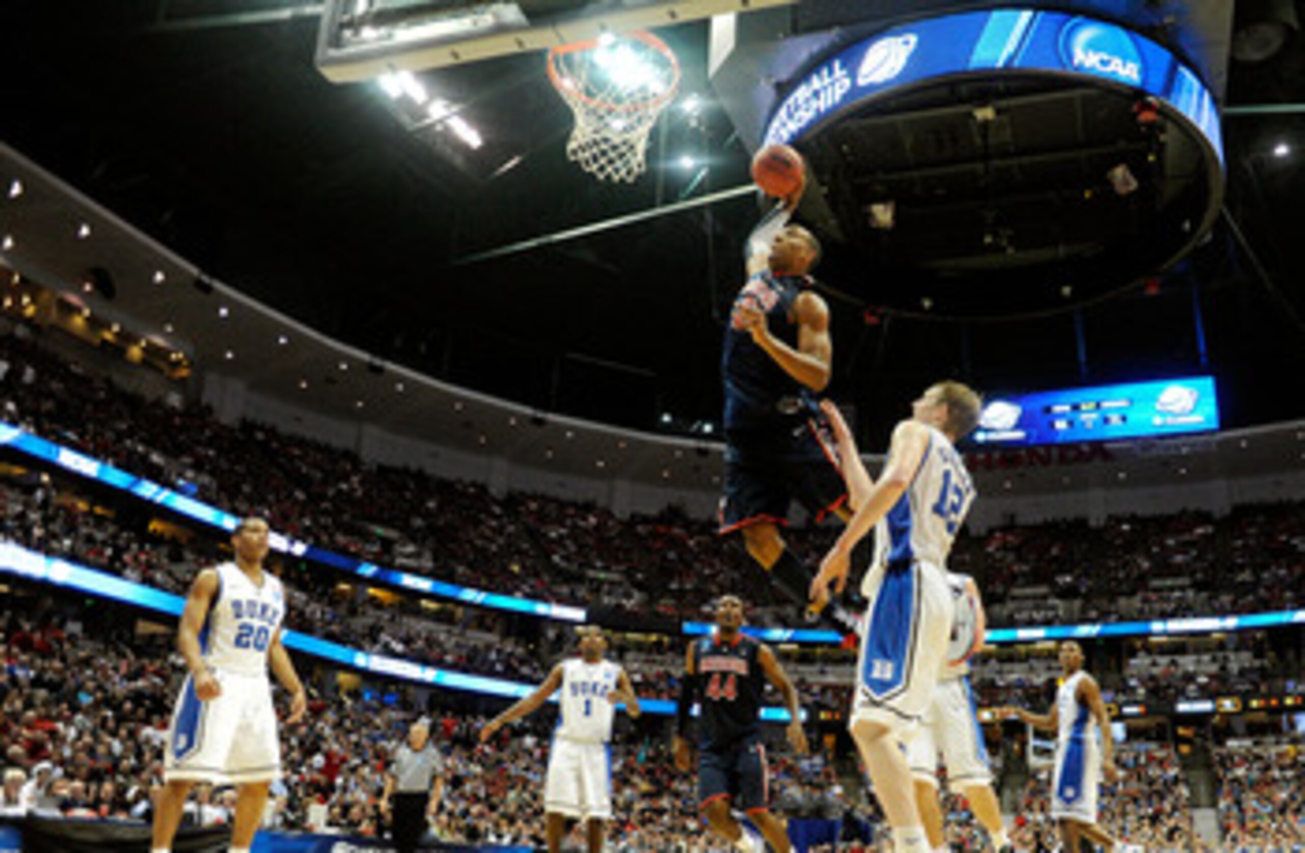 ANAHEIM, CA - MARCH 24: Derrick Williams #23 of the Arizona Wildcats dunks the over Kyle Singler #12 of the Duke Blue Devils during the west regional semifinal of the 2011 NCAA men's basketball tournament at the Honda Center on March 24, 2011 in Anaheim, ANAHEIM, CA - MARCH 24: Derrick Williams #23 of the Arizona Wildcats dunks the over Kyle Singler #12 of the Duke Blue Devils during the west regional semifinal of the 2011 NCAA men's basketball tournament at the Honda Center on March 24, 2011 in Anaheim,