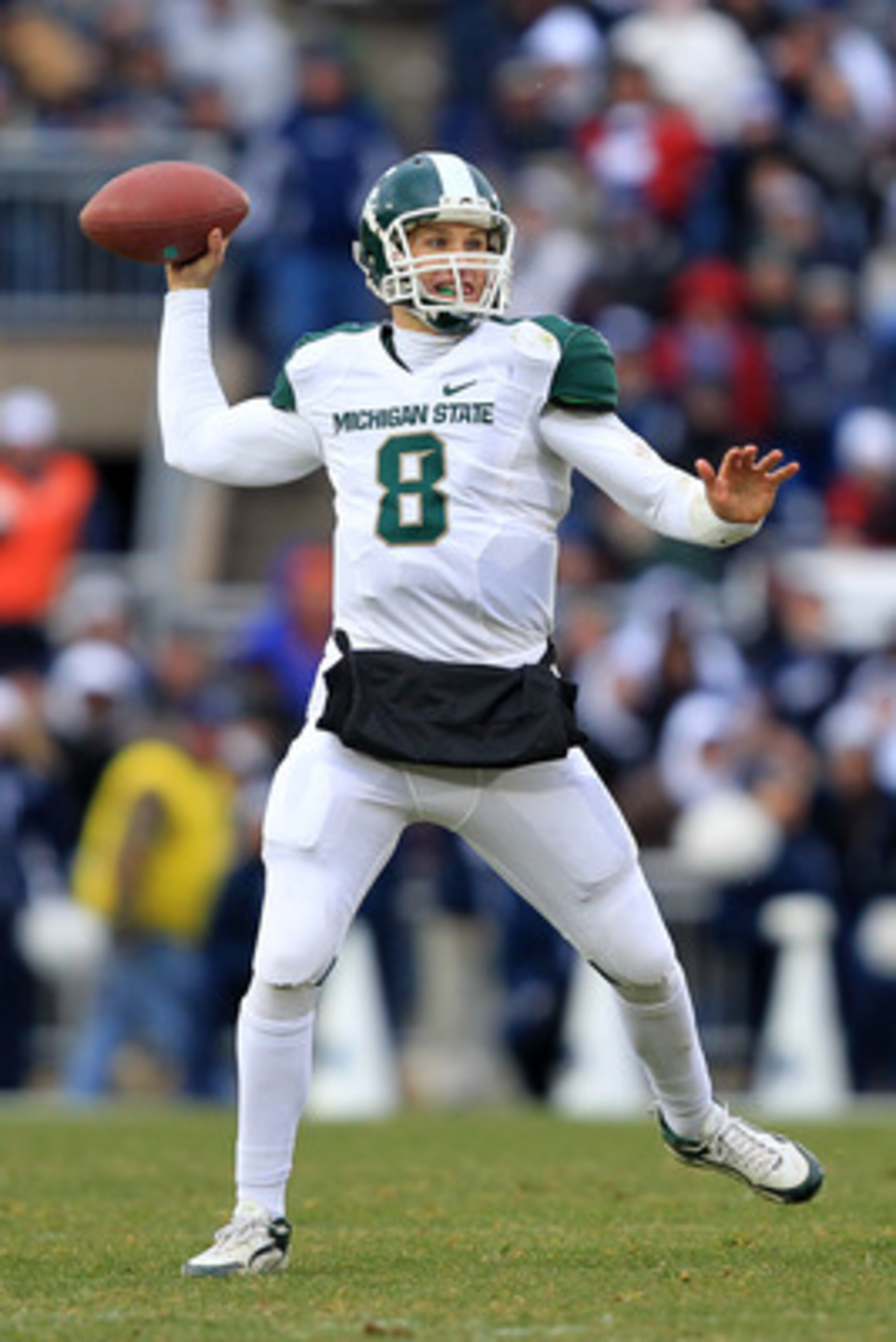 STATE COLLEGE, PA - NOVEMBER 27: Quarterback Kirk Cousins #8 of the Michigan State Spartans throws a pass during a game against the Penn State Nittany Lions on November 27, 2010 at Beaver Stadium in State College, Pennsylvania. The Spartans won 28-22. (Ph STATE COLLEGE, PA - NOVEMBER 27: Quarterback Kirk Cousins #8 of the Michigan State Spartans throws a pass during a game against the Penn State Nittany Lions on November 27, 2010 at Beaver Stadium in State College, Pennsylvania. The Spartans won 28-22. (Ph