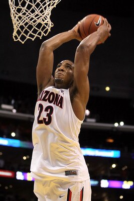 LOS ANGELES, CA - MARCH 11:  Derrick Williams #23 of the Arizona Wildcats dunks the ball to end the first half while taking on the USC Trojans in the semifinals of the 2011 Pacific Life Pac-10 Men's Basketball Tournament at Staples Center on March 11, 201