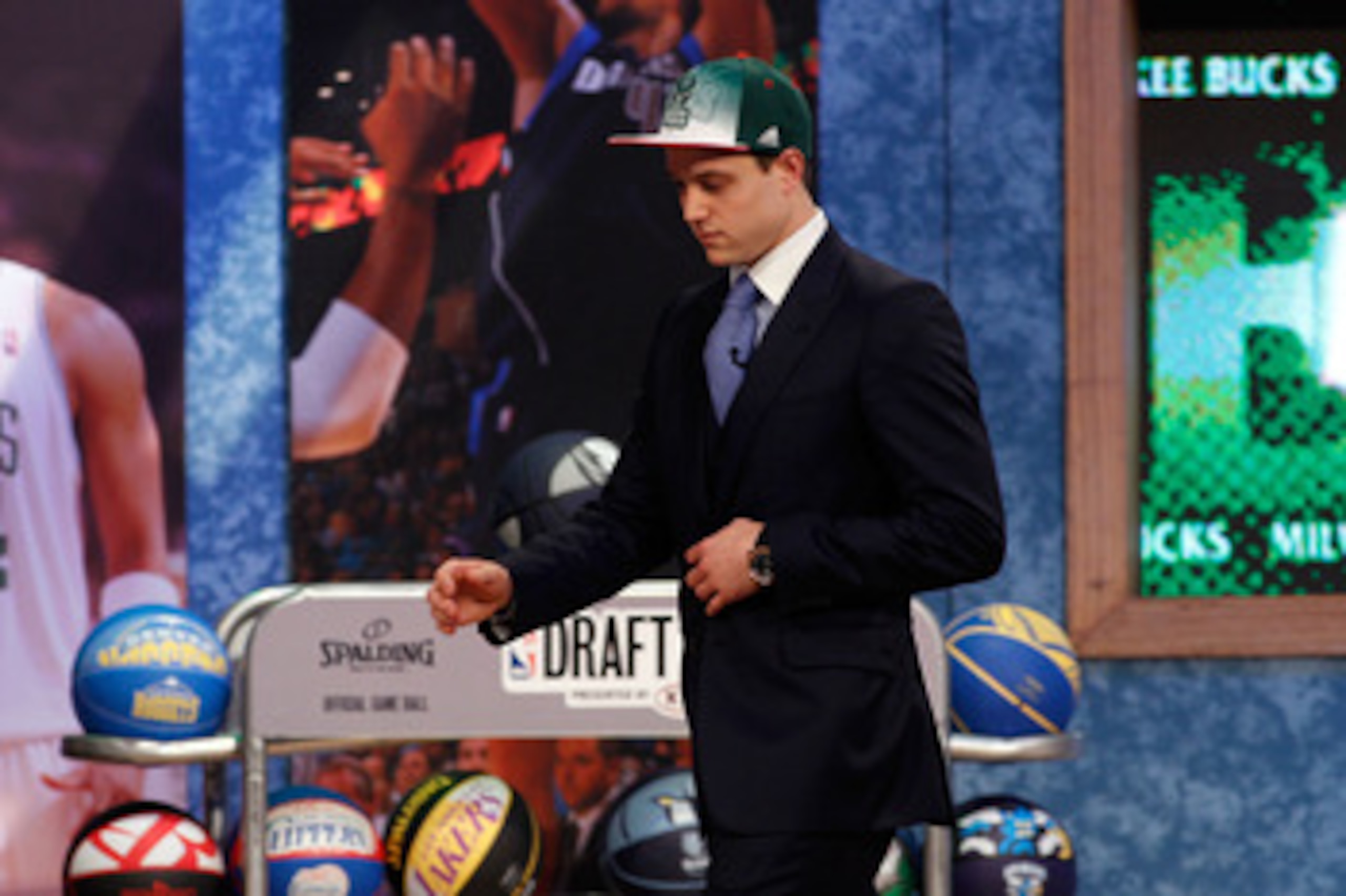 NEWARK, NJ - JUNE 23:  Jimmer Fredette from BYU walks off stage after he was selected #10 overall by the Milwaukee Bucks in the first round during the 2011 NBA Draft at the Prudential Center on June 23, 2011 in Newark, New Jersey.  NOTE TO USER: User expr