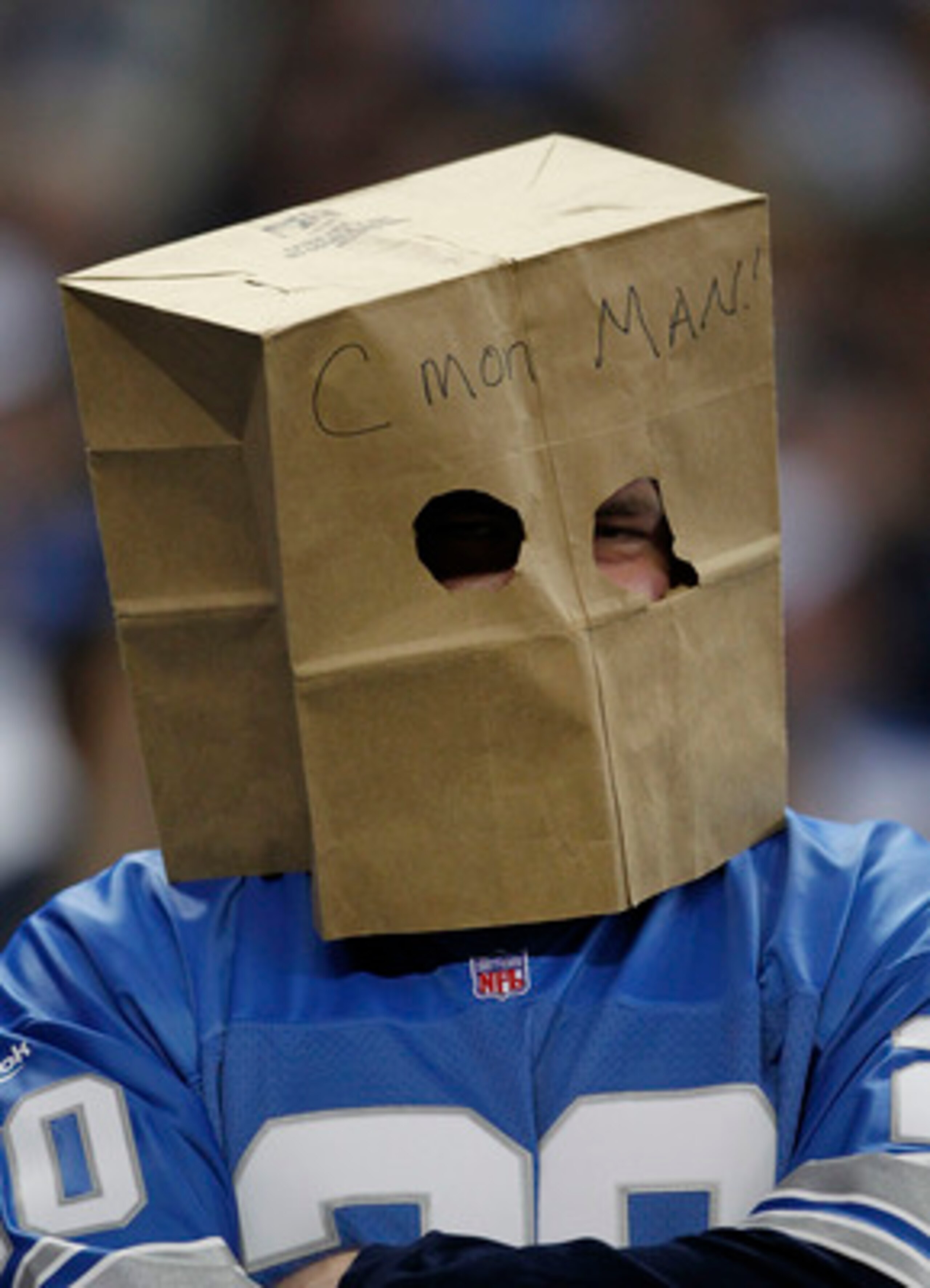 DETROIT - DECEMBER 05:  A Detroit Lions' fan shows his fustration during the game between the Detroit Lions and the Chicago Bears at Ford Field on December 5, 2010 in Detroit, Michigan. The Bears defeated the Lions 24-20.  (Photo by Leon Halip/Getty Image