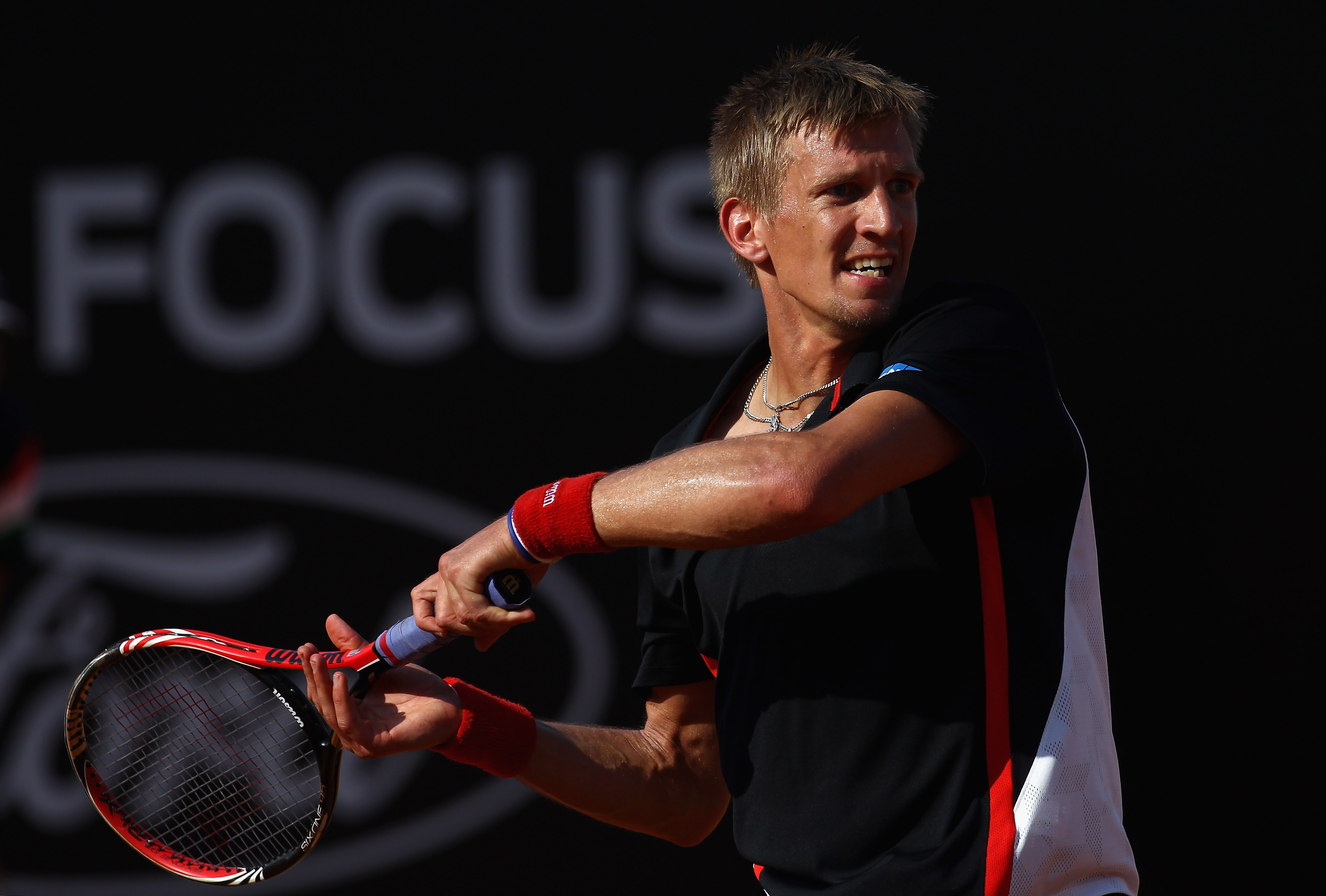 ROME, ITALY - MAY 12:  Jarkko Nieminen of Finland hits a backhand return during his third round match against Tomas Berdych of Czech Republic during day five of the Internazionali BNL d'Italia at the Foro Italico Tennis Centre on May 12, 2011 in Rome, Ita