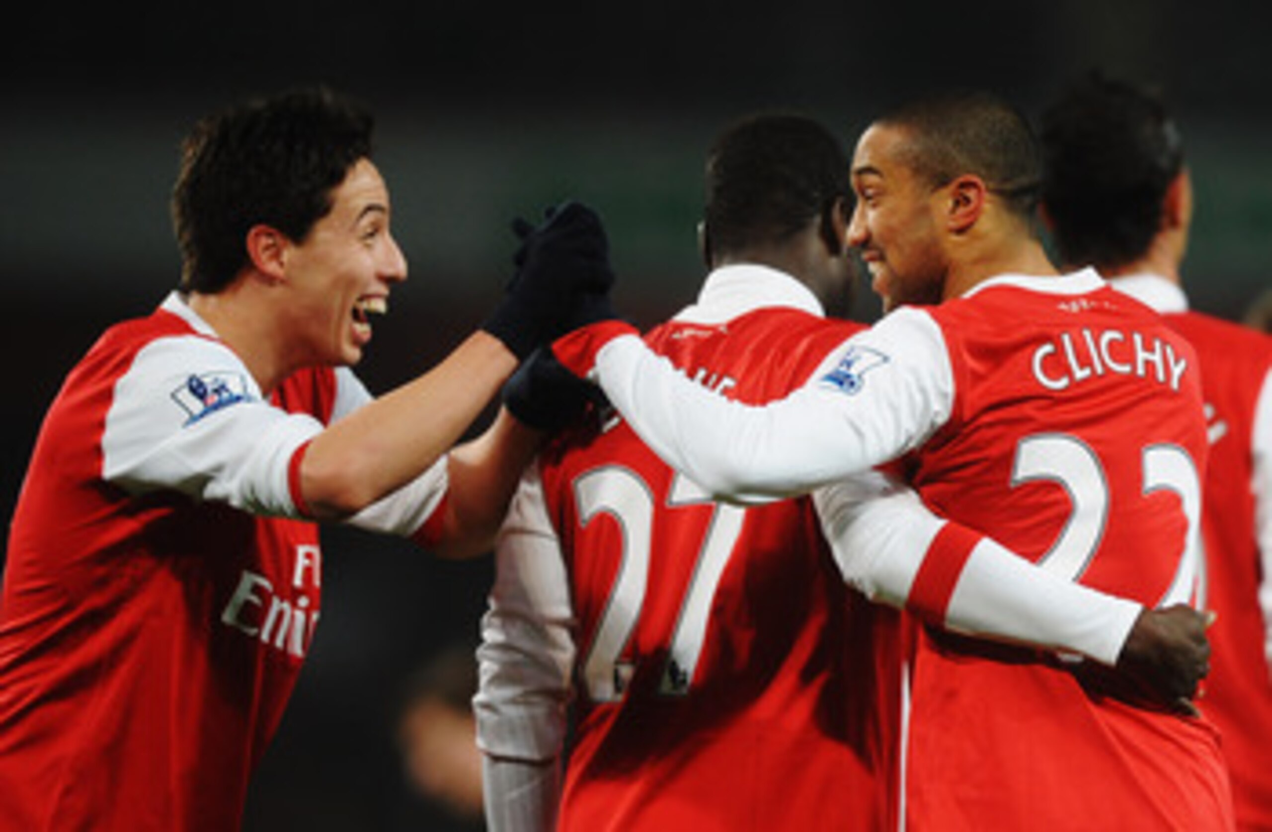 LONDON, UNITED KINGDOM - MARCH 02:  Gael Clichy (R) of Arsenal celebrates with team mate Samir Nasri (L) after scoring his sides fifth goal during the FA Cup sponsored by E.ON 5th Round Replay match between between Arsenal and Leyton Orient at the Emirate